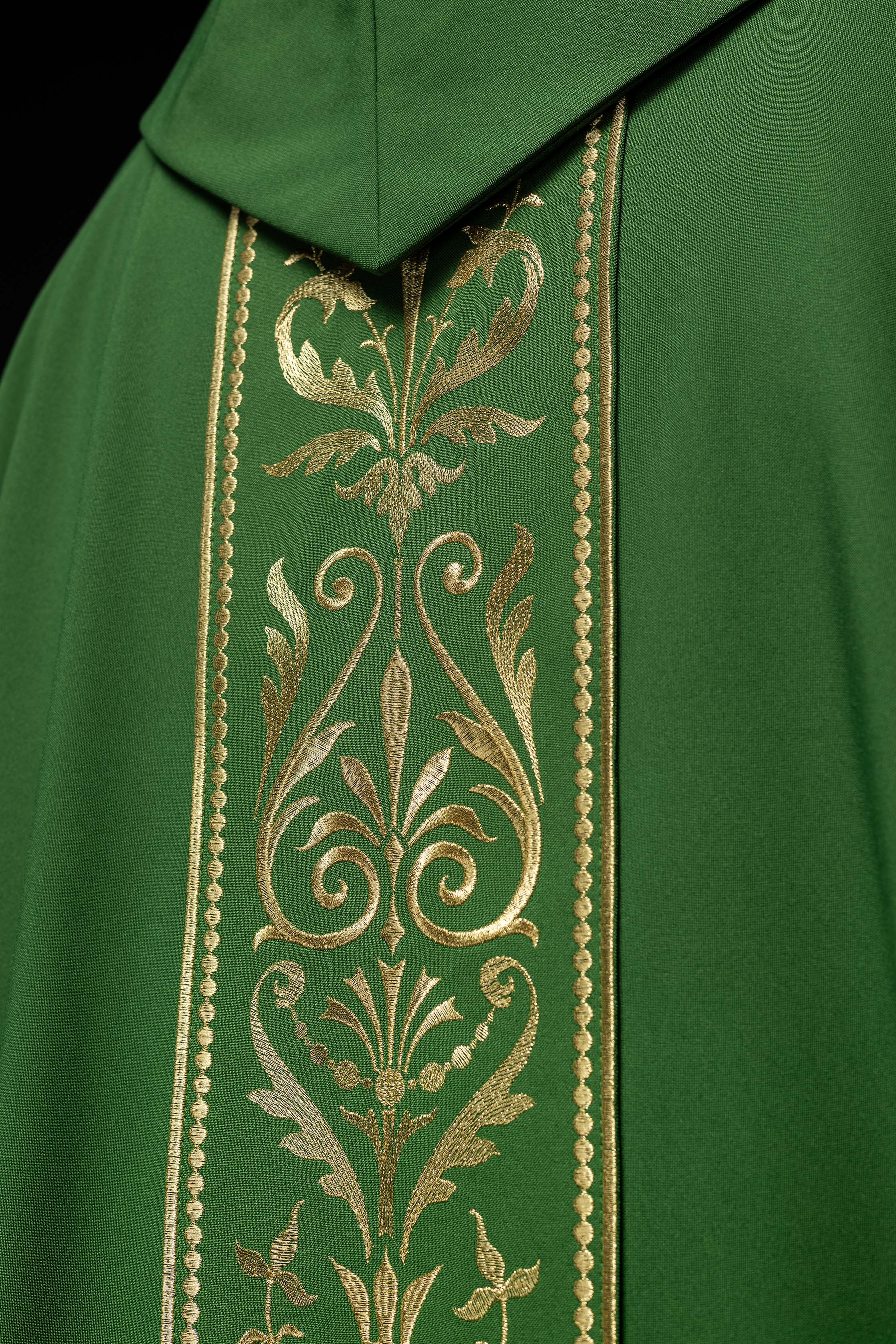 Green liturgical chasuble decorated with gold embroidered belt
