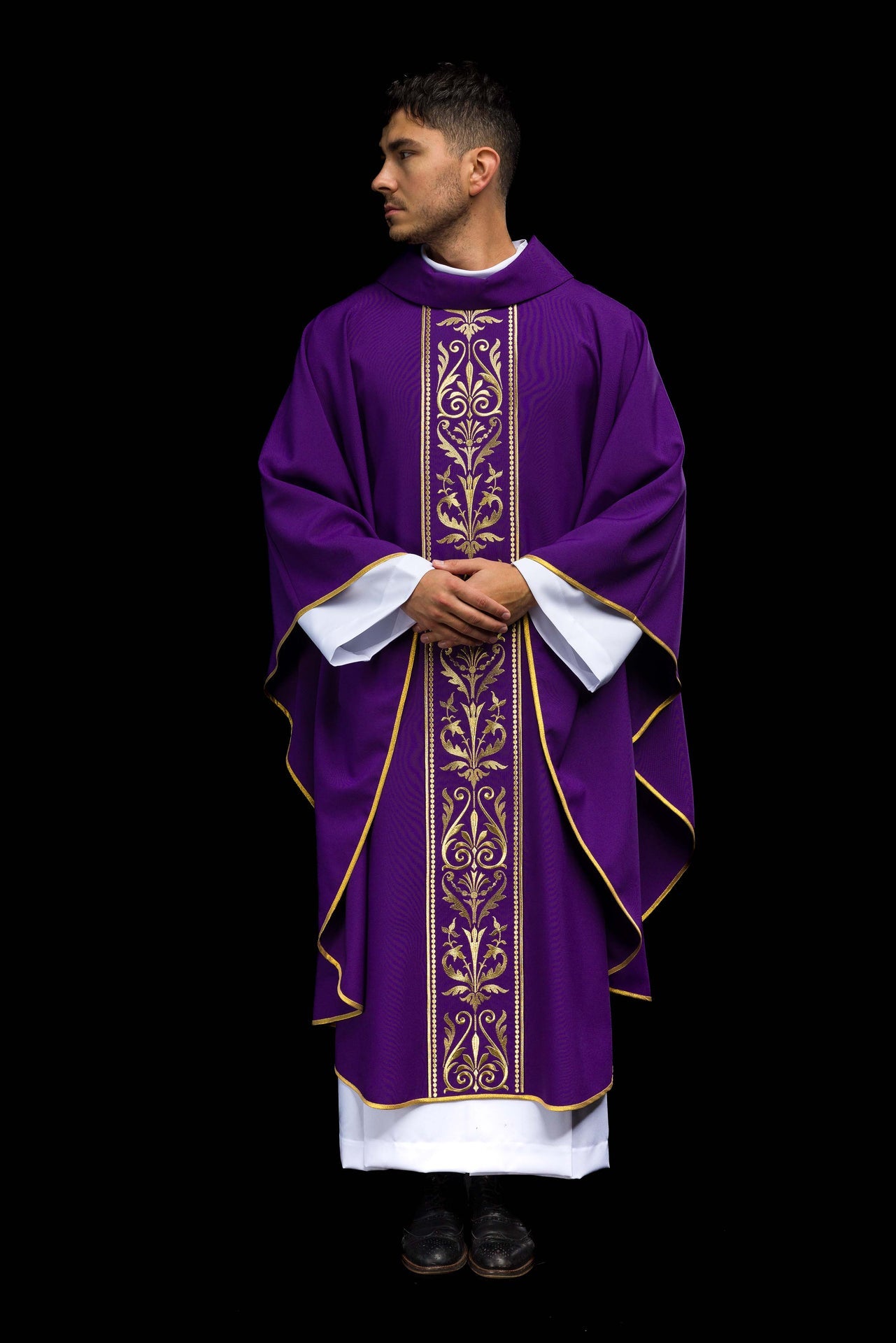 Purple liturgical chasuble decorated with gold embroidered belt