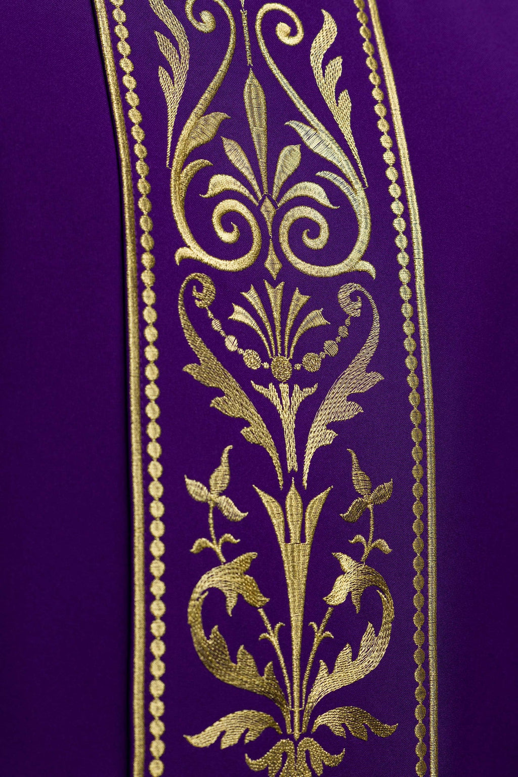 Purple liturgical chasuble decorated with gold embroidered belt