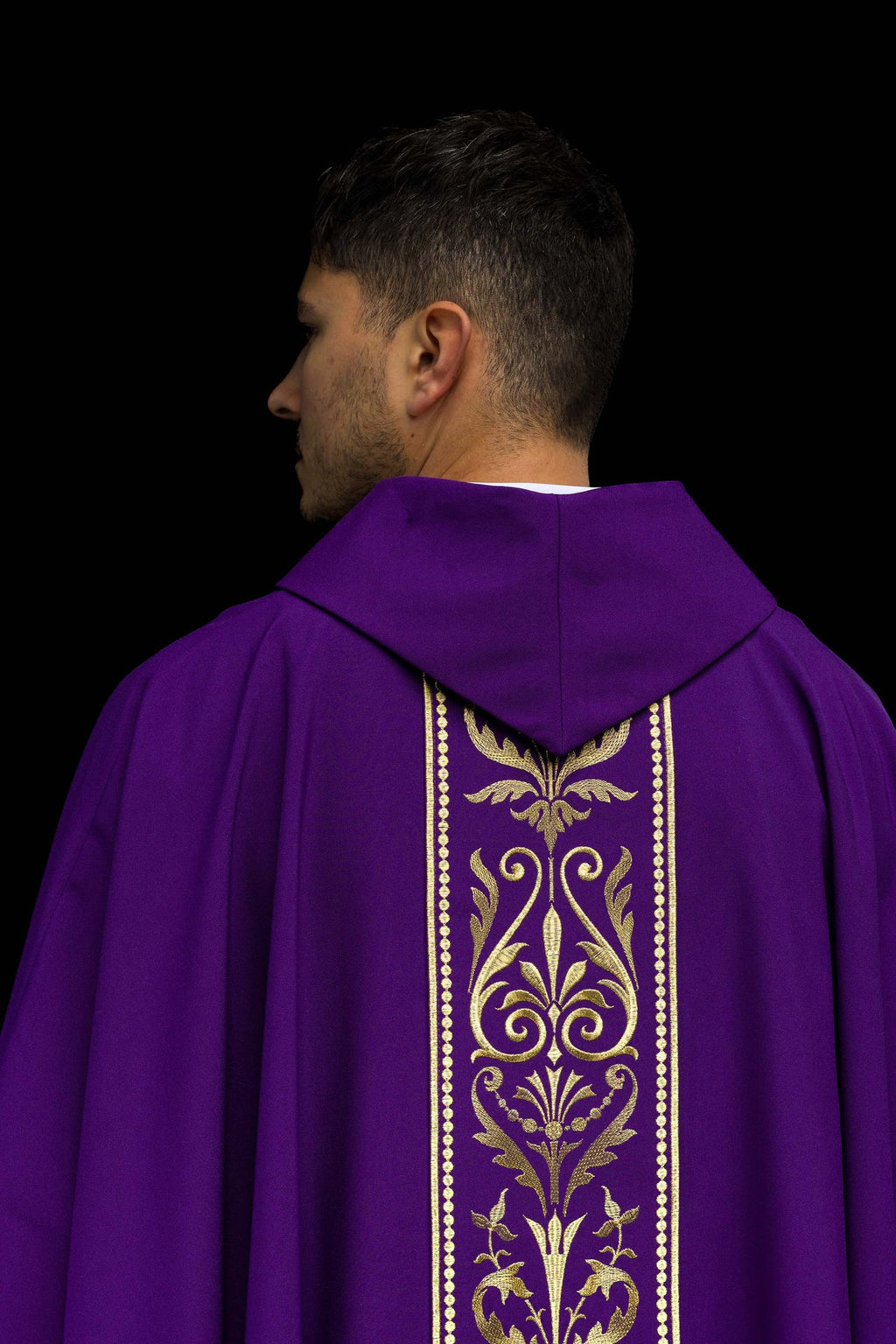 Purple liturgical chasuble decorated with gold embroidered belt