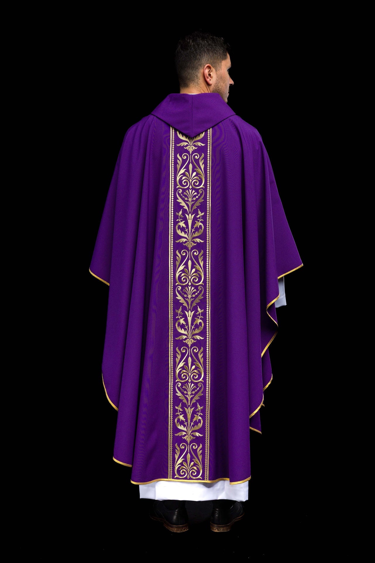 Purple liturgical chasuble decorated with gold embroidered belt