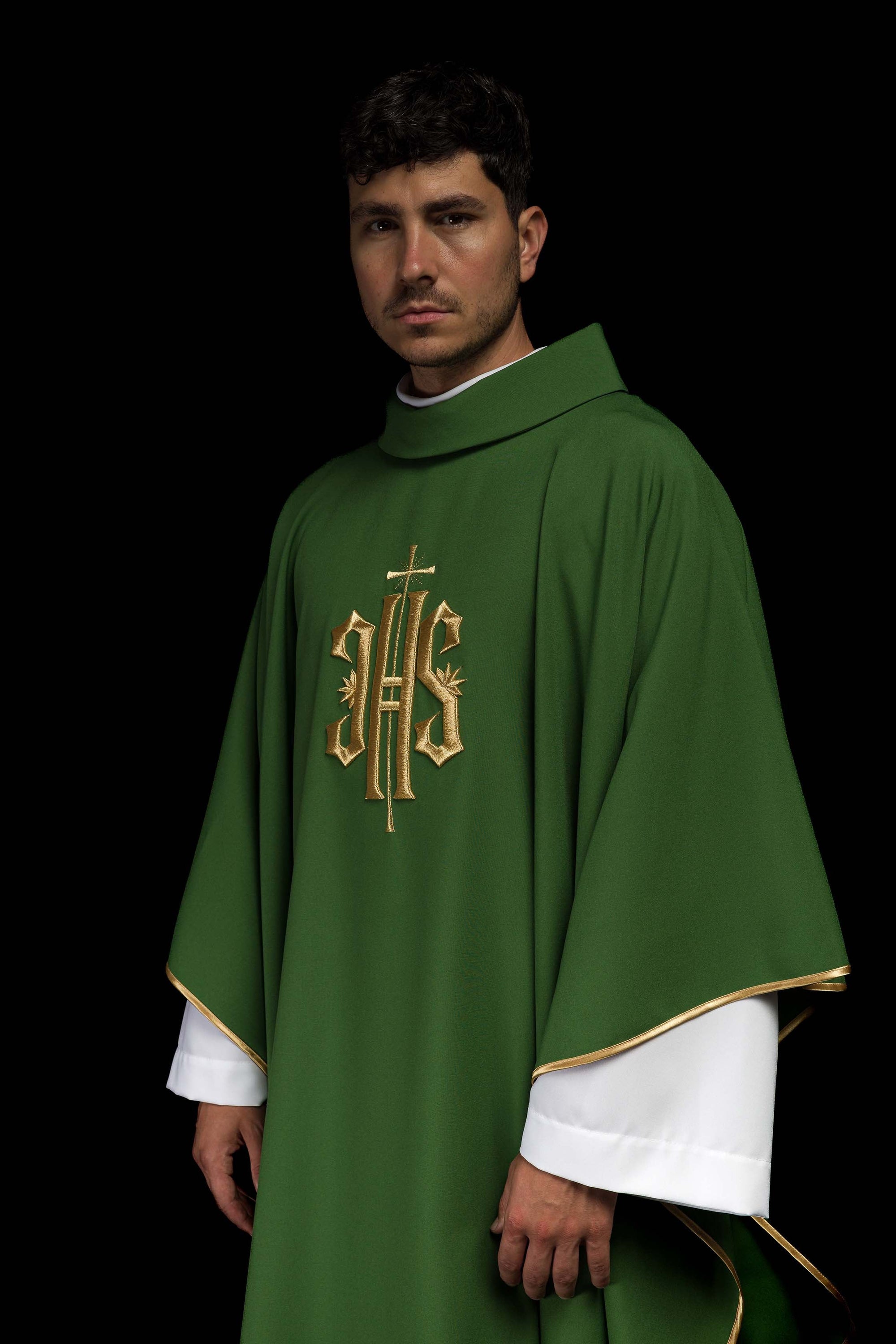 Green embroidered chasuble with gold IHS motif