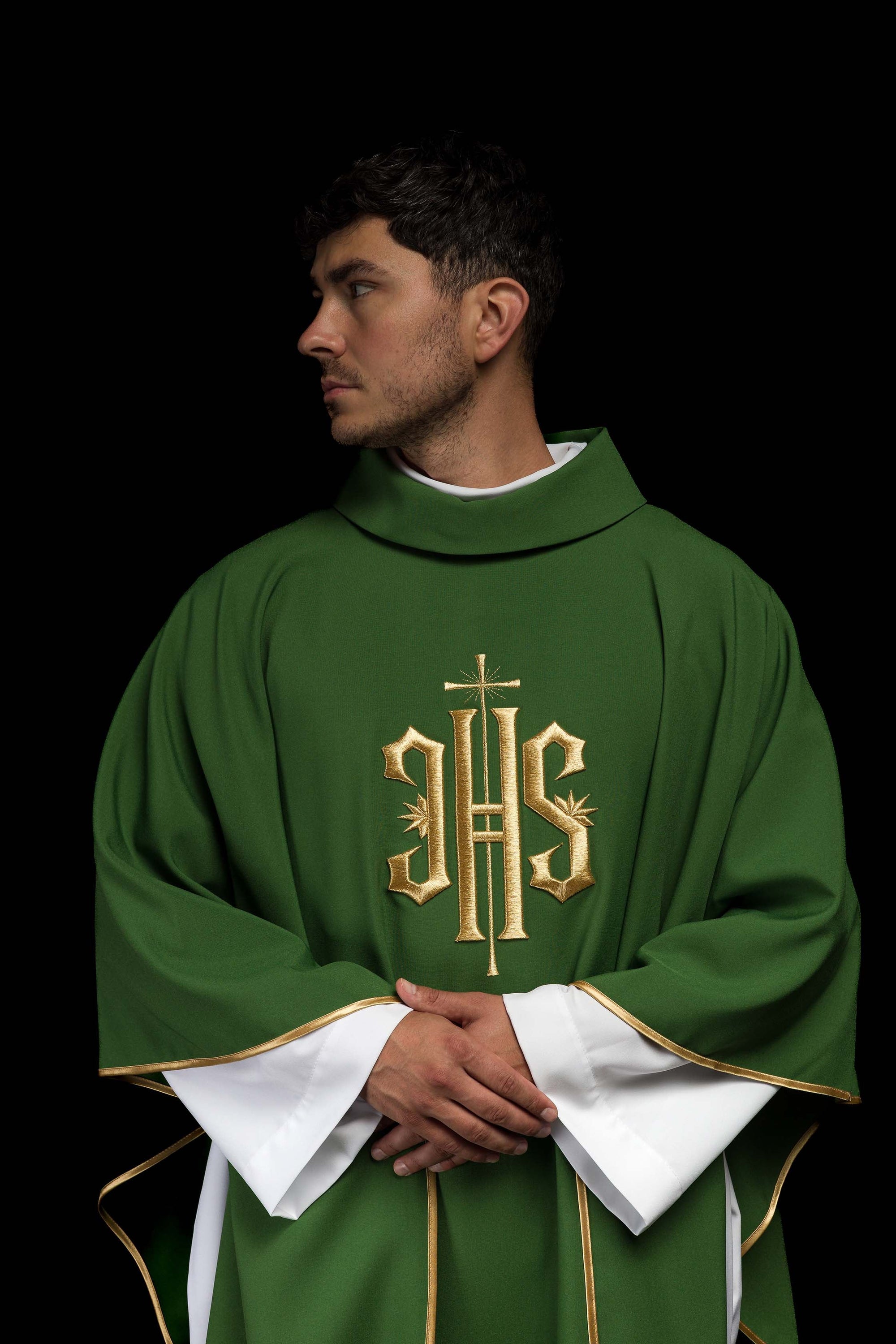 Green embroidered chasuble with gold IHS motif