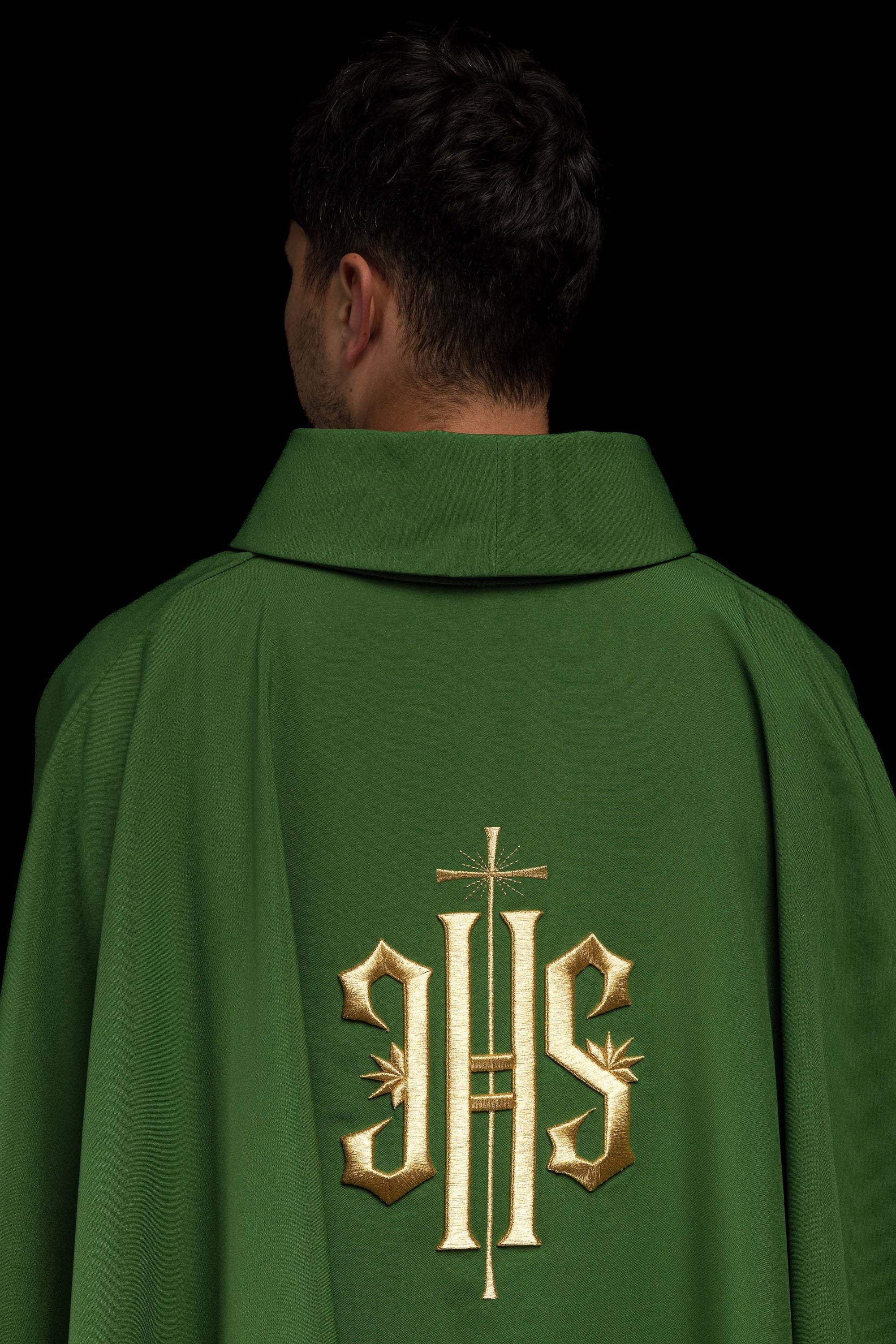 Green embroidered chasuble with gold IHS motif