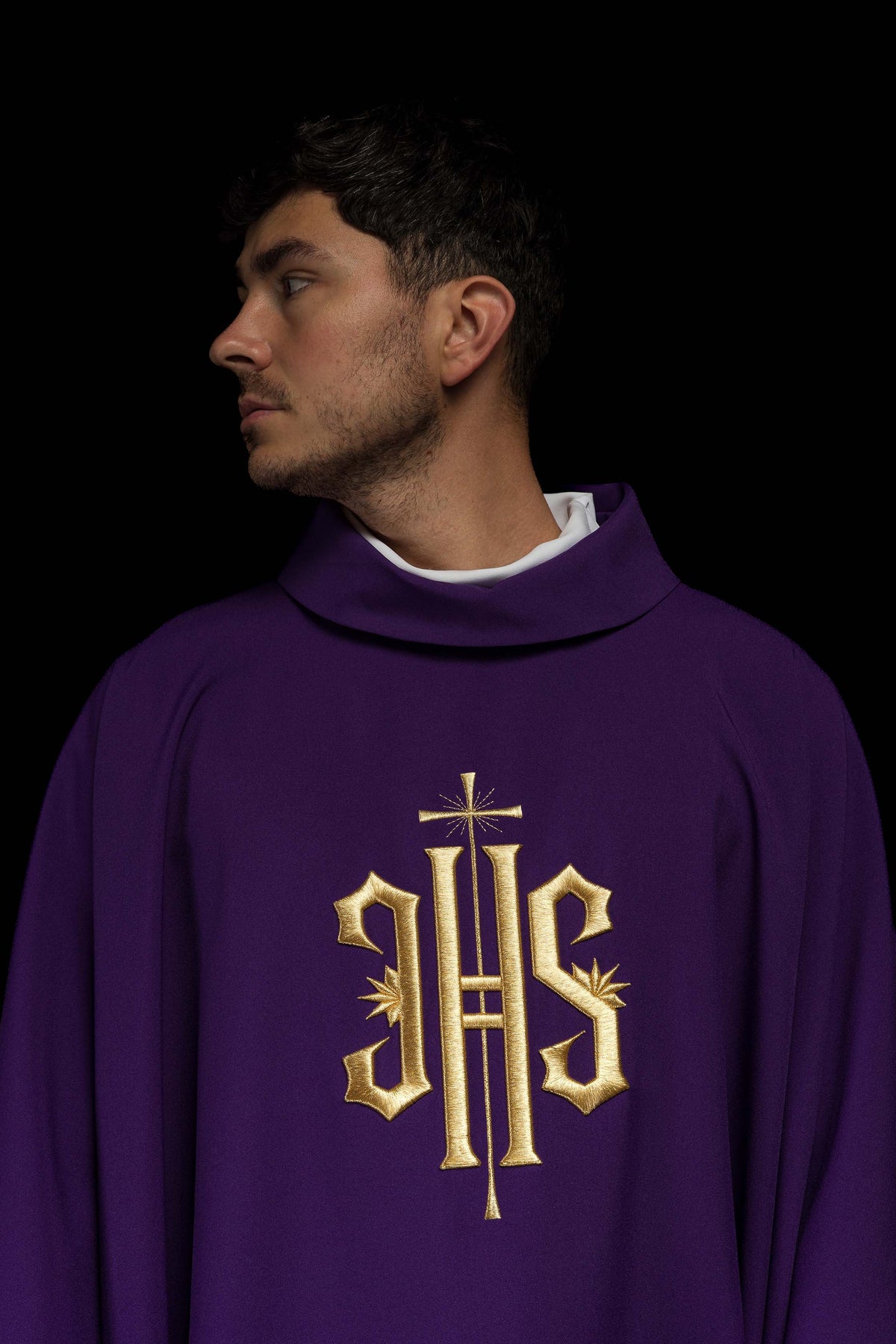Purple embroidered chasuble with gold IHS motif