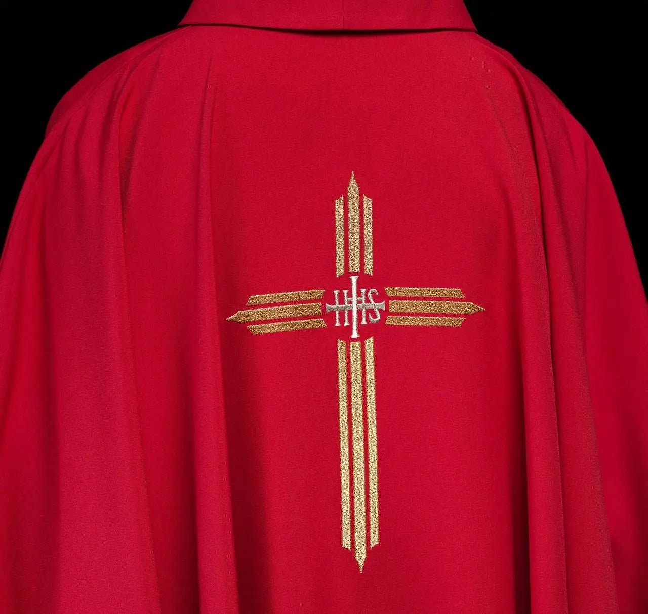 Red chasuble embroidered with IHS Cross