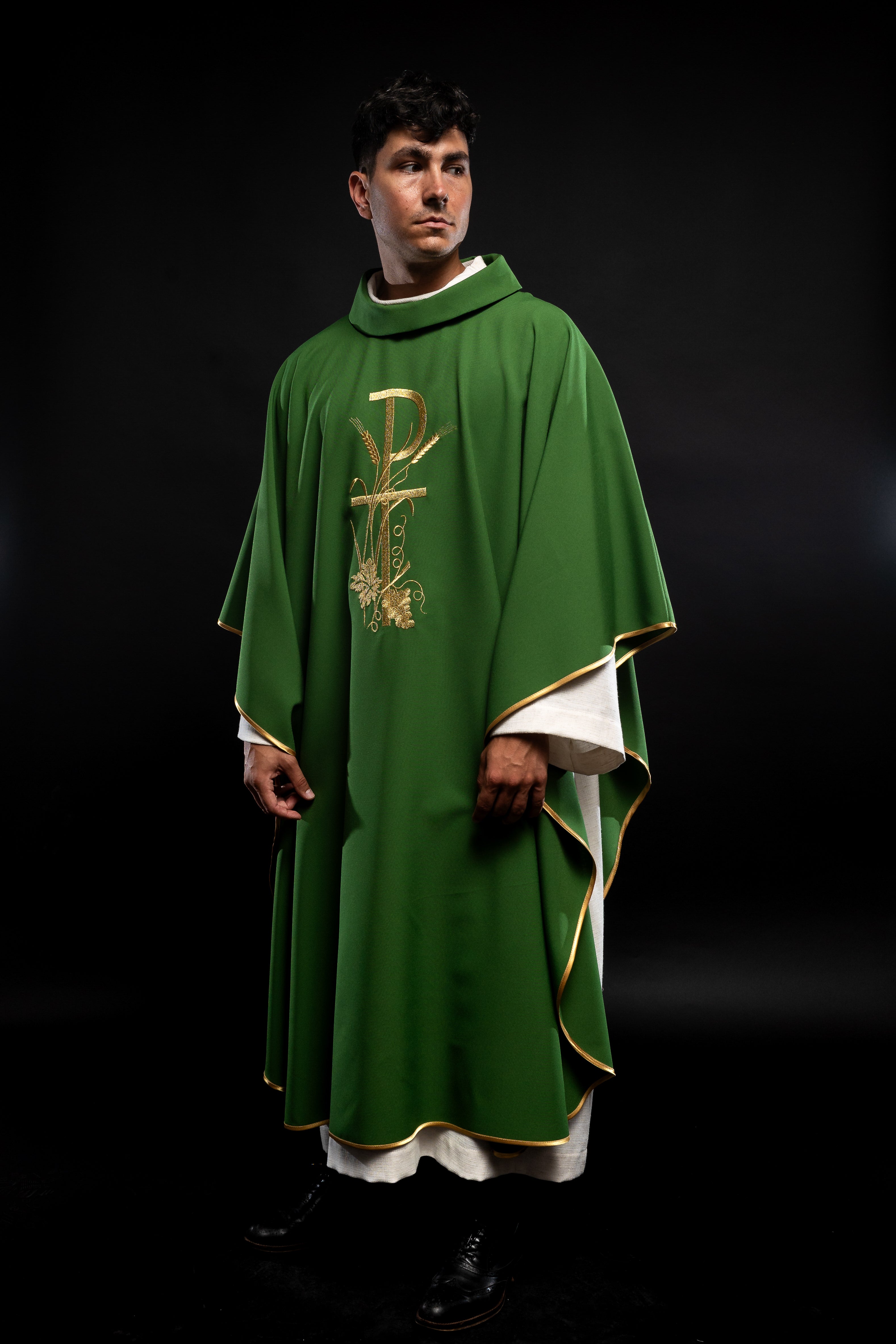 Green chasuble with gold cross embroidery