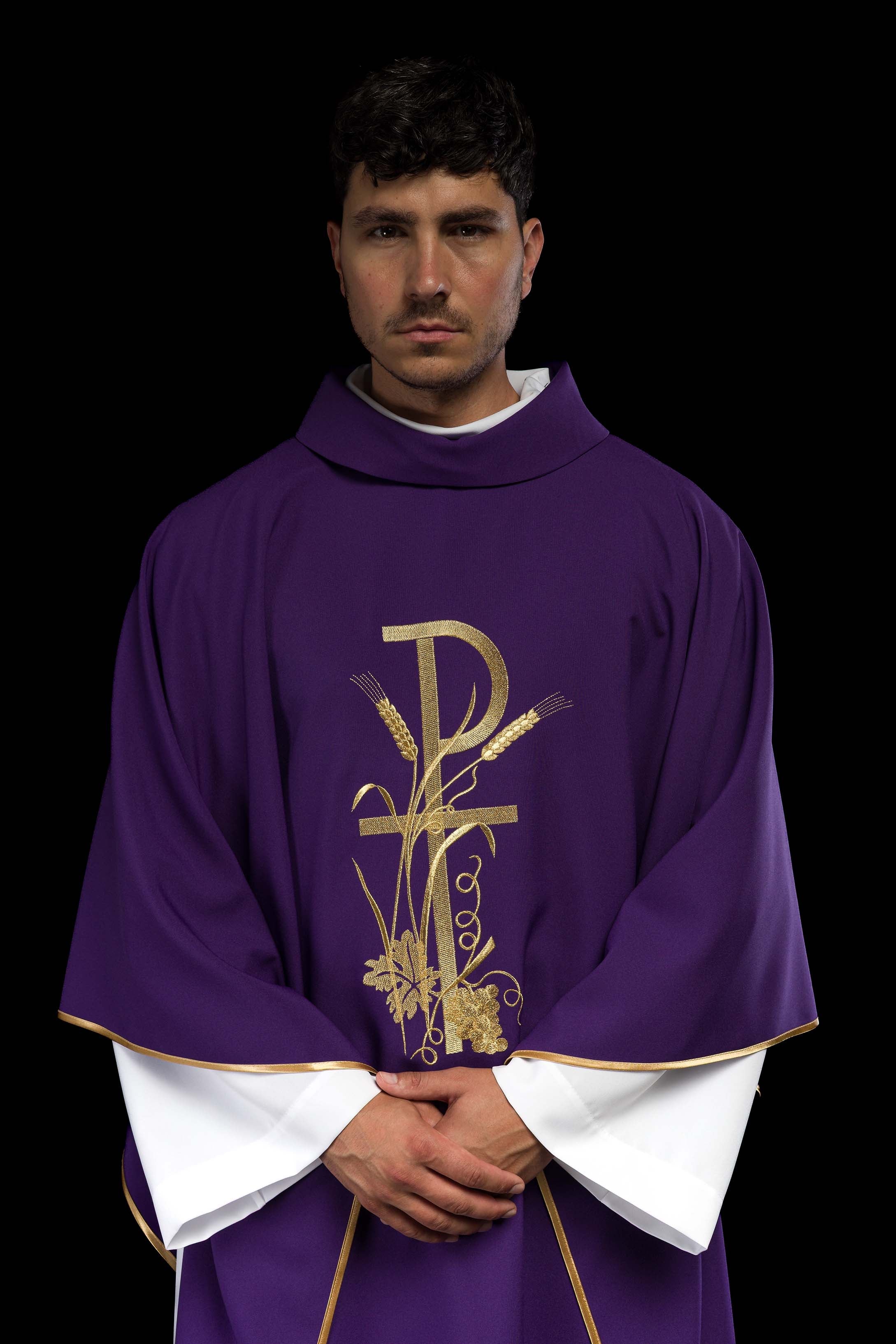 Purple chasuble with gold cross embroidery