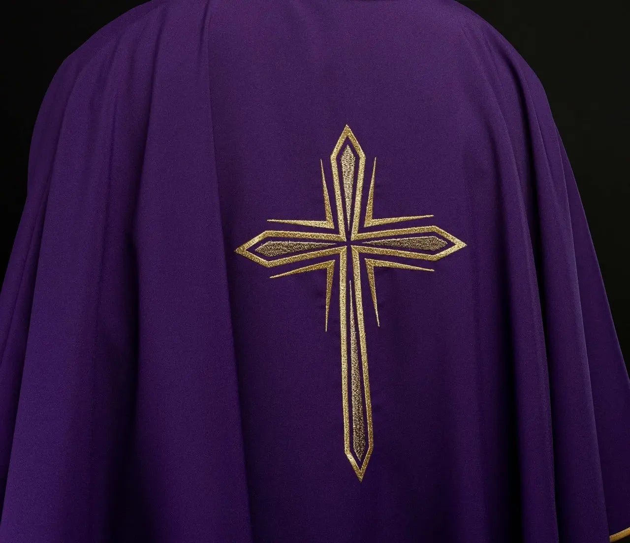 Purple chasuble with embroidery of the cross and gold piping