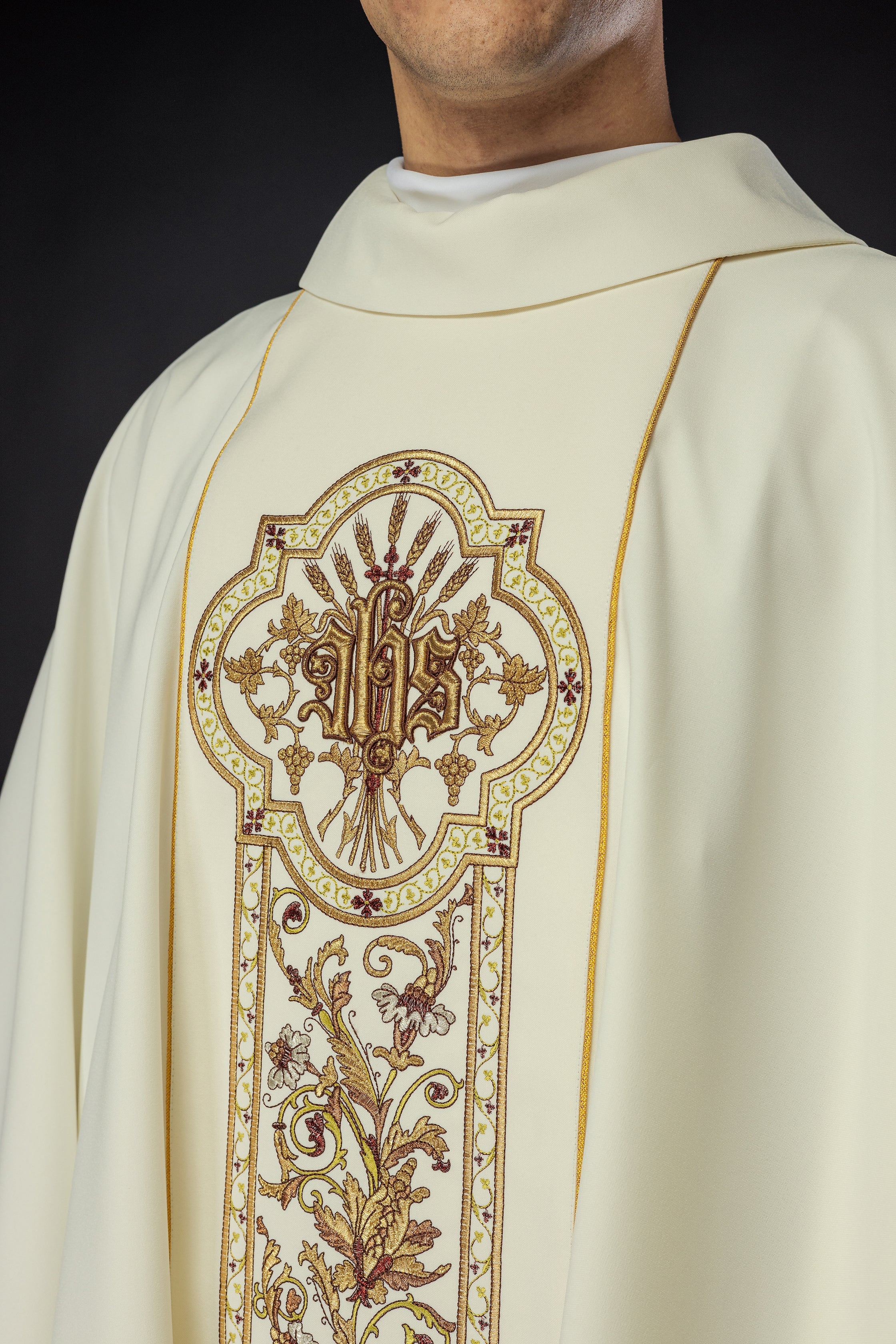 Richly decorated chasuble with IHS motif in ecru colour