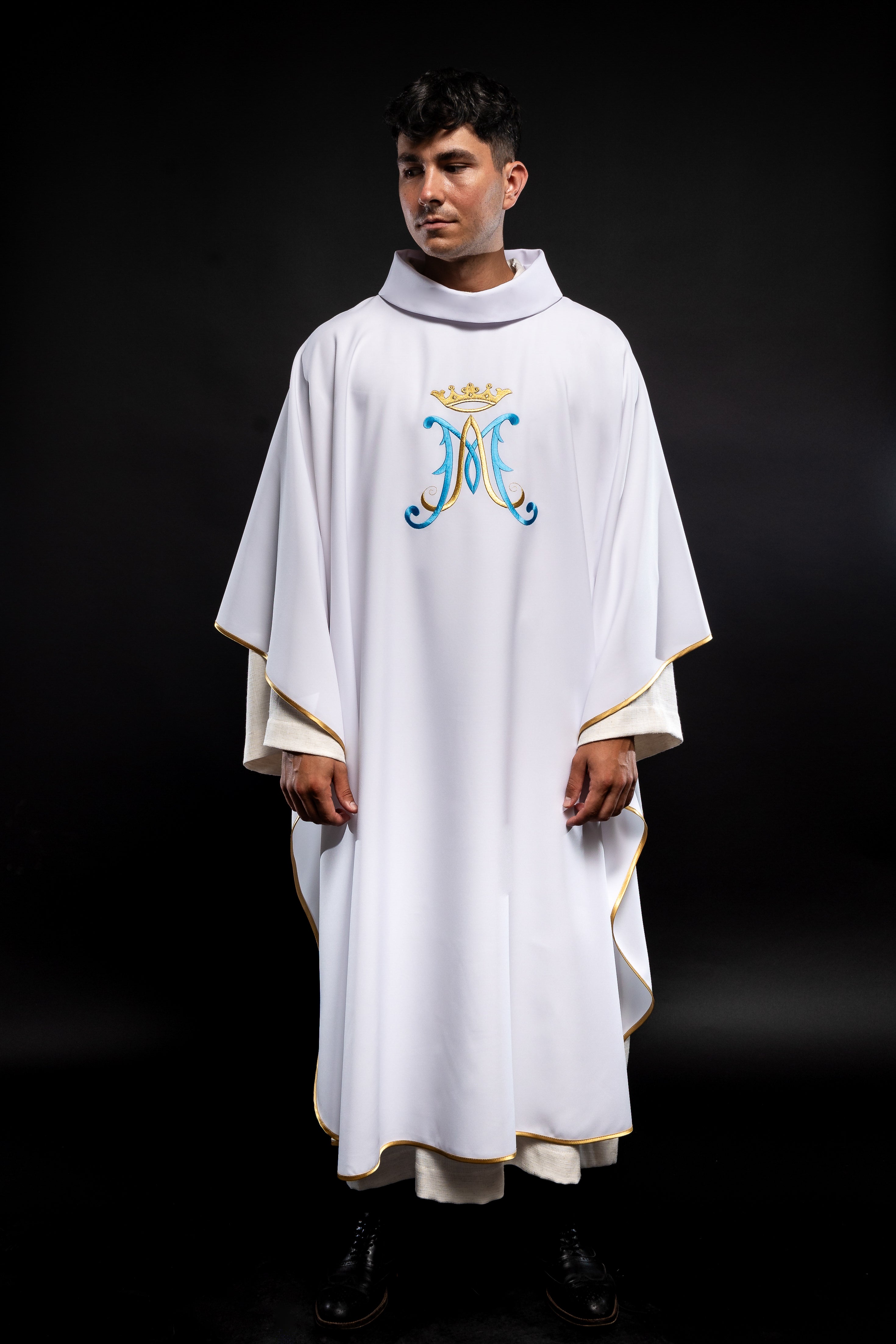 White chasuble embroidered with Marian motif