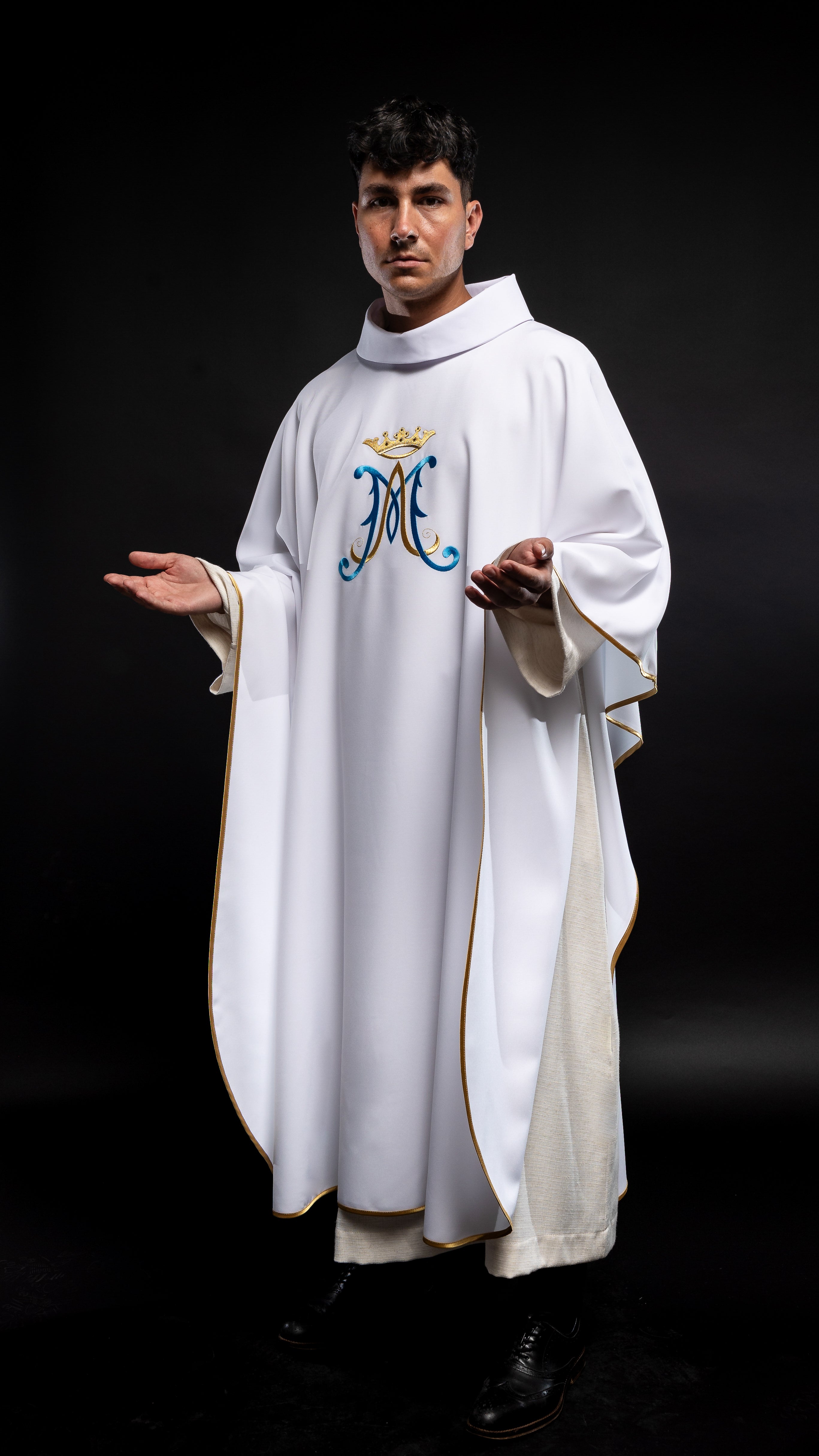 White chasuble embroidered with Marian motif