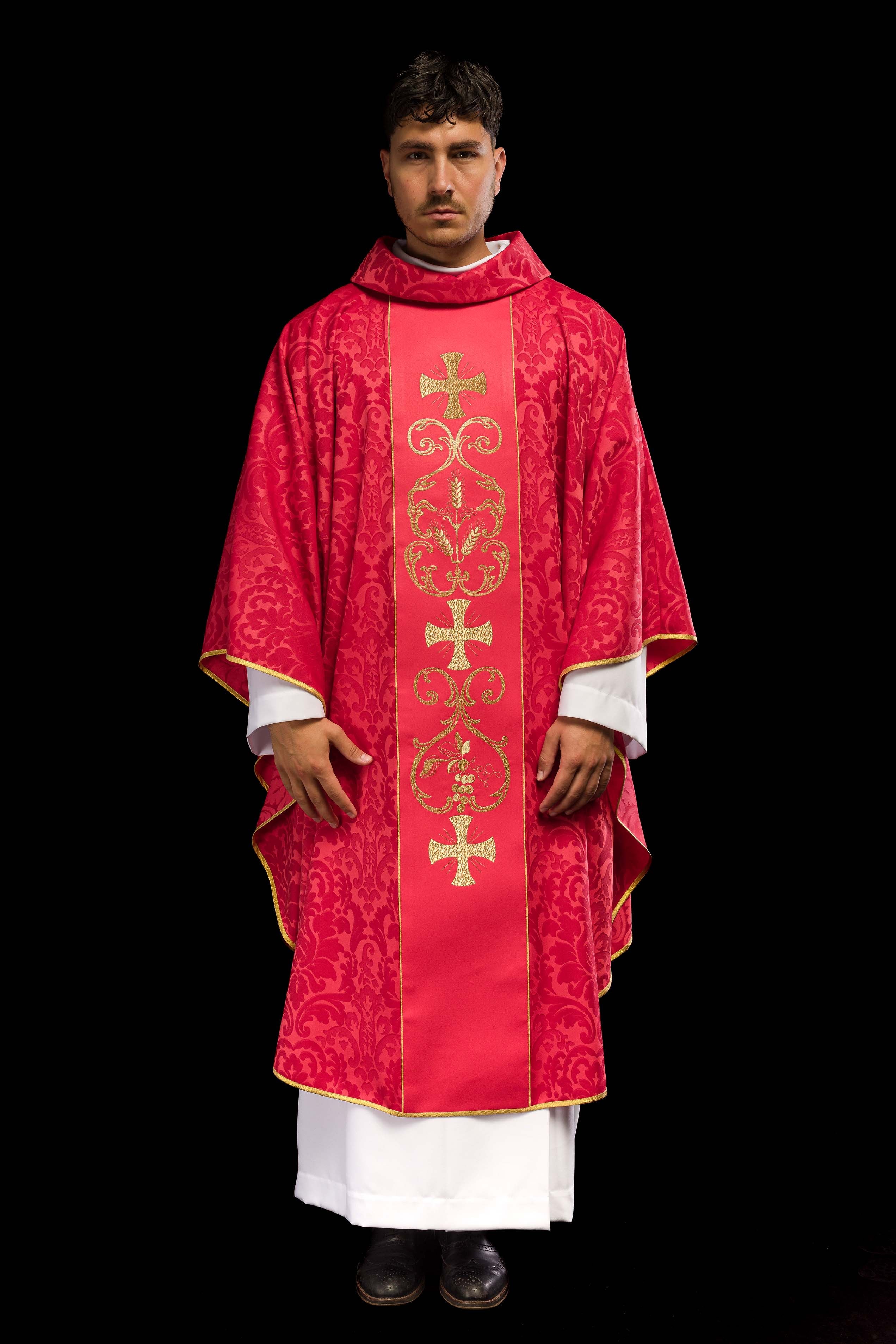 Red liturgical chasuble decorated with embroidered belt