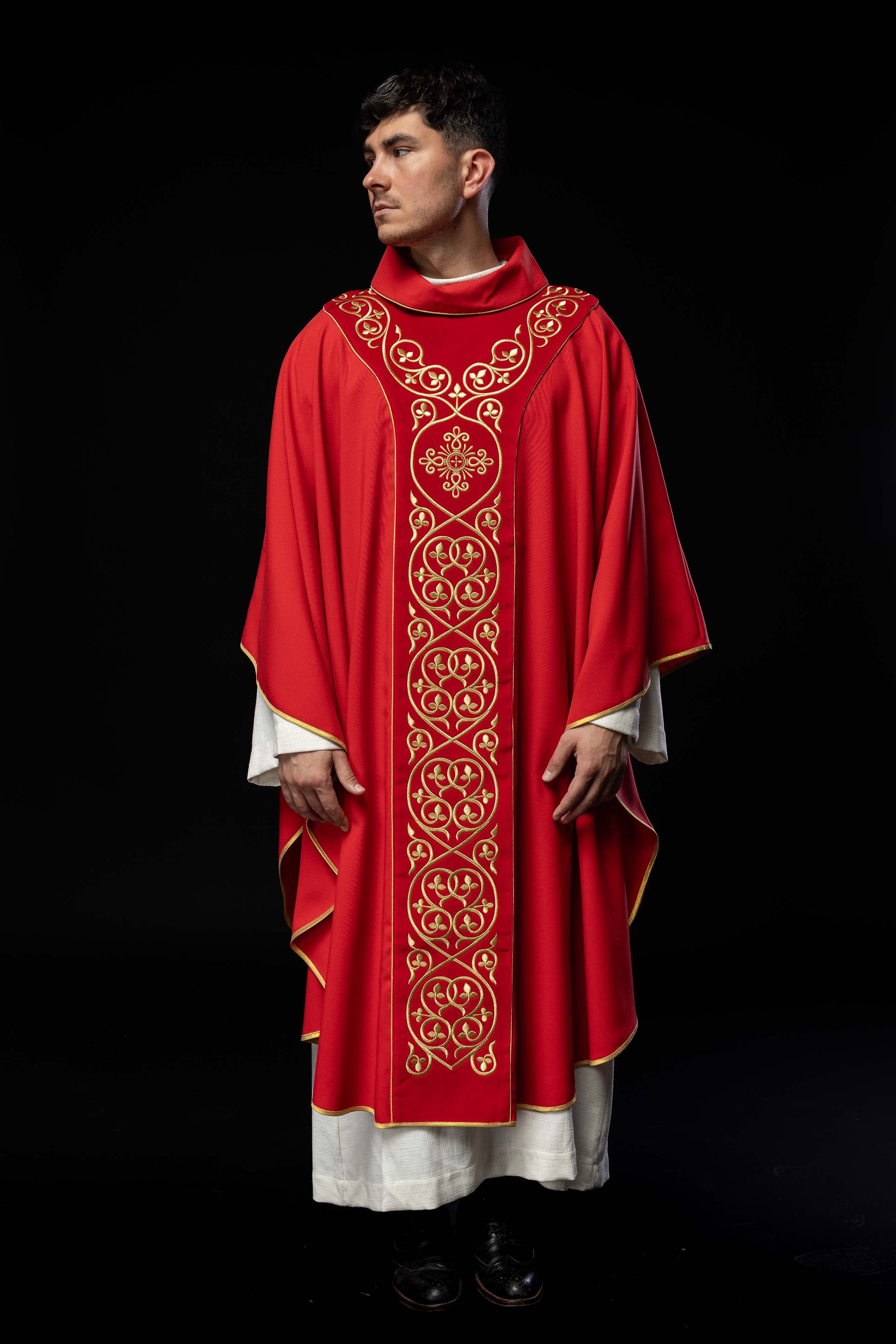 Red liturgical chasuble decorated with embroidery on velvet