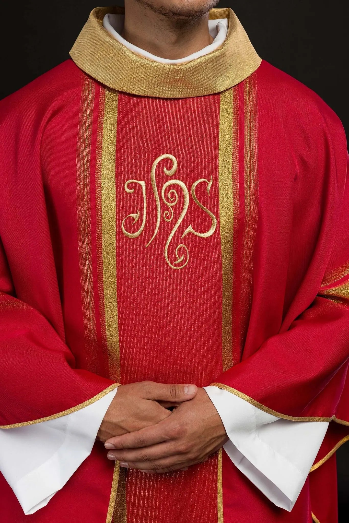 Red embroidered chasuble with IHS design with gilding