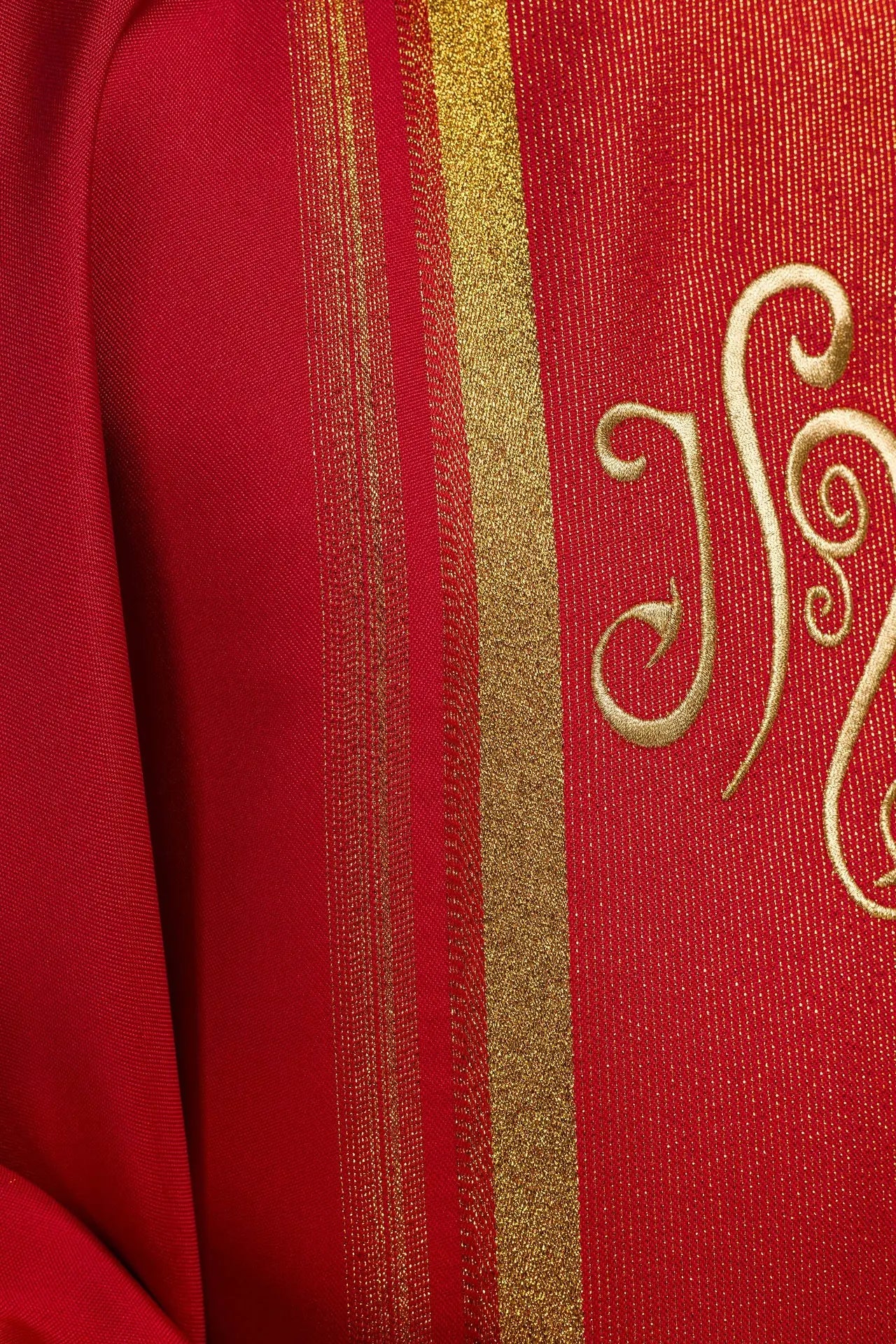 Red embroidered chasuble with IHS design with gilding
