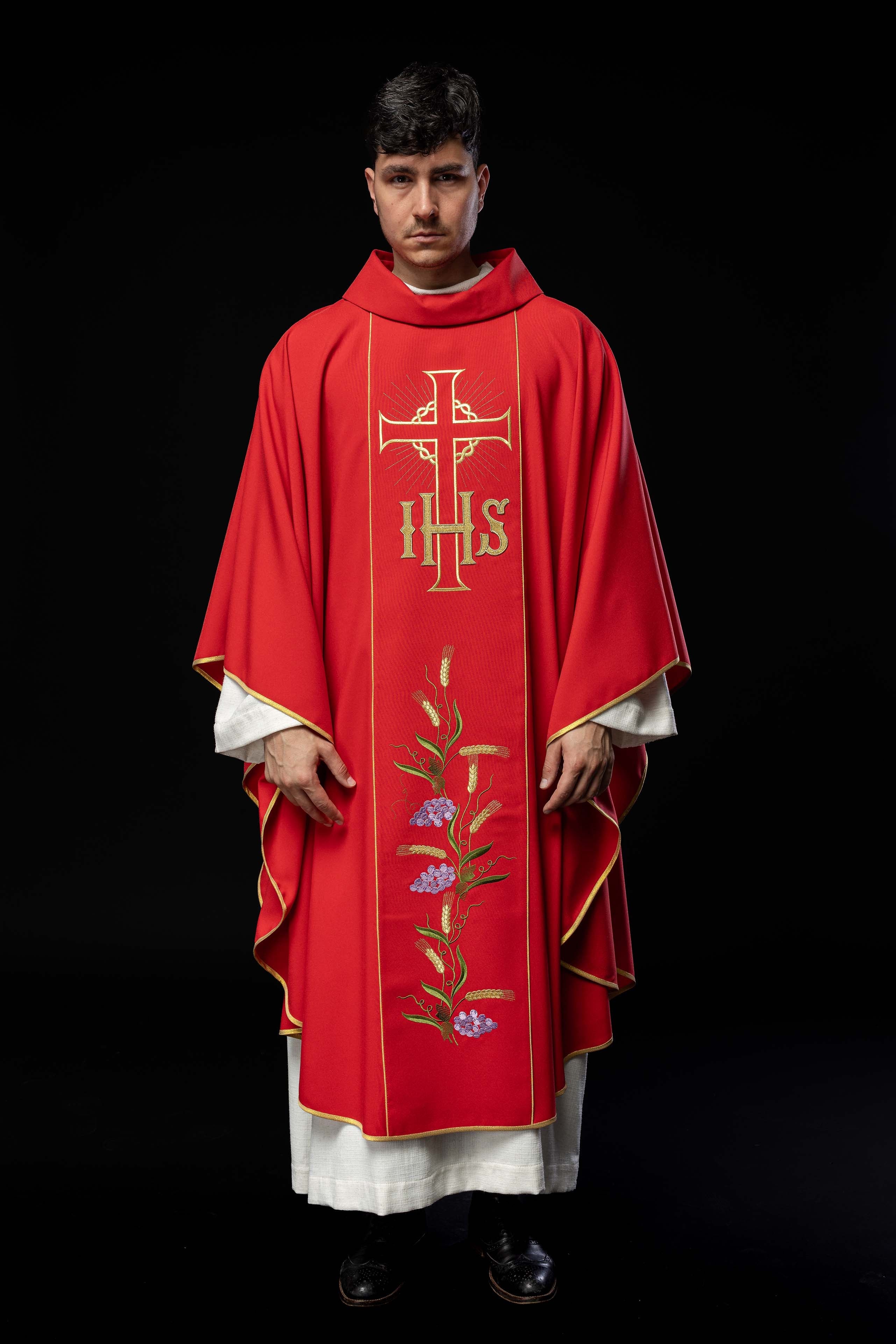 Red chasuble with decorated gold belt with IHS and ears