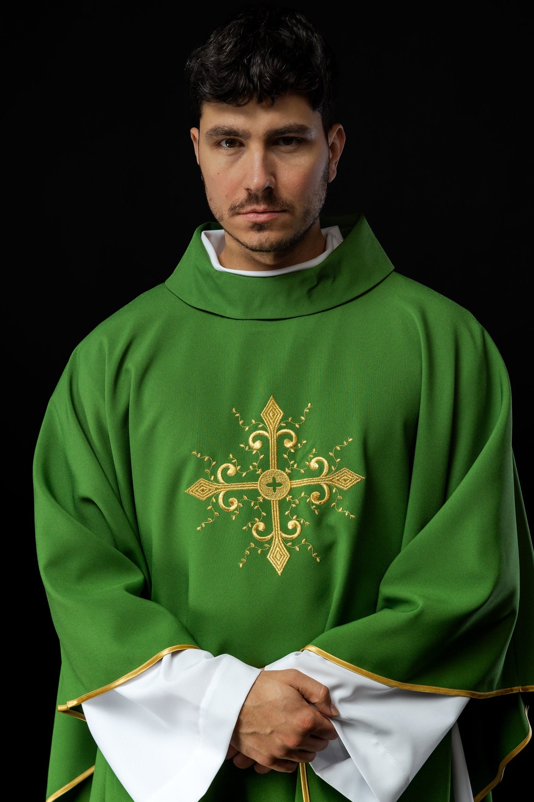 Green chasuble embroidered with cross motif