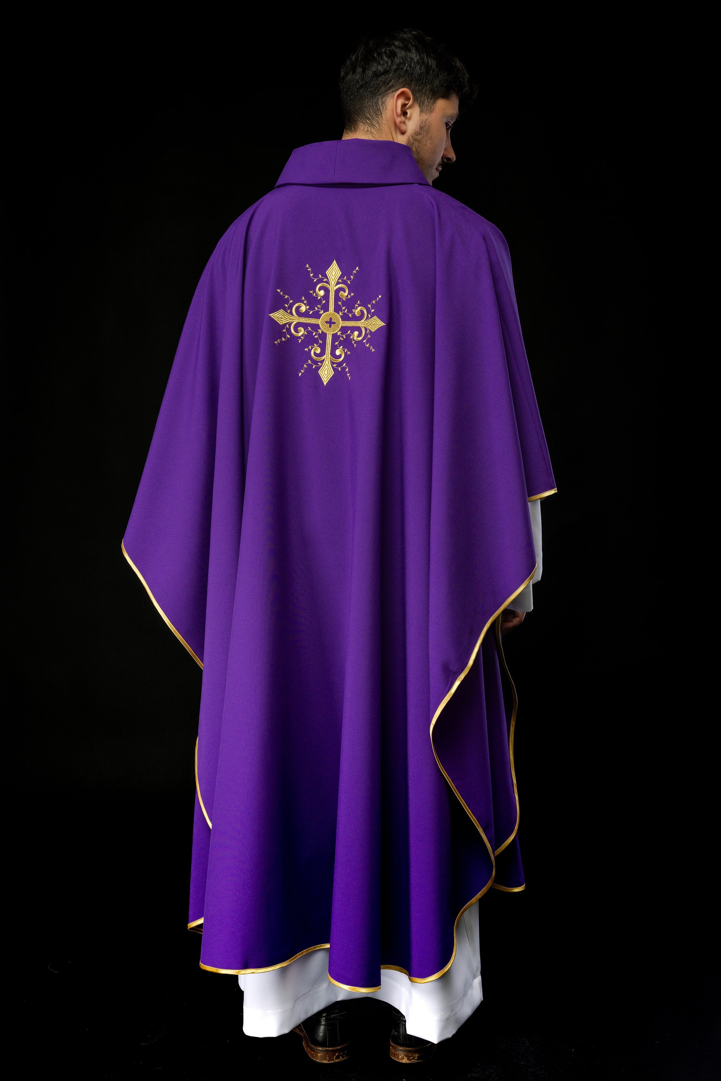 Purple chasuble embroidered with cross motif