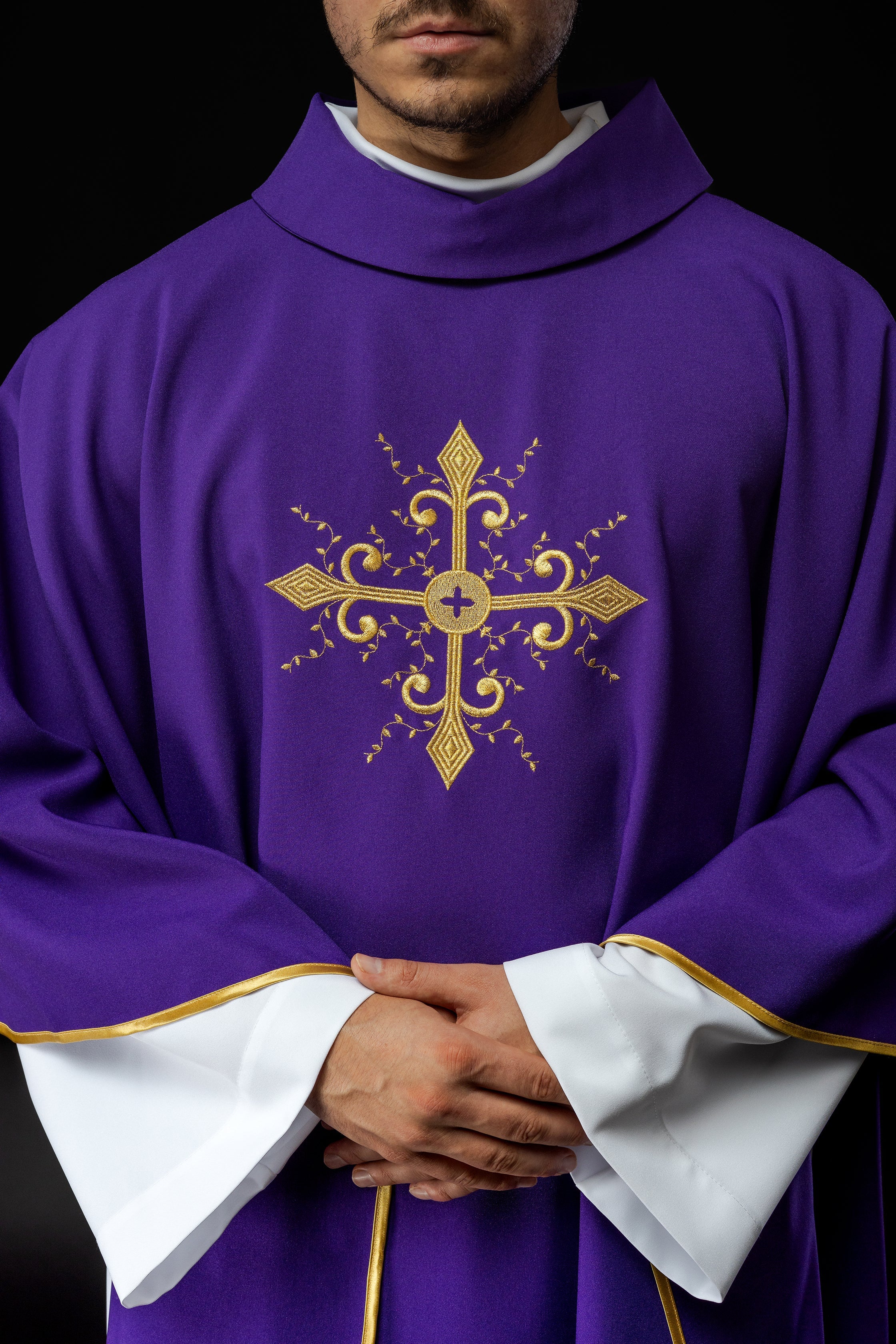 Purple chasuble embroidered with cross motif