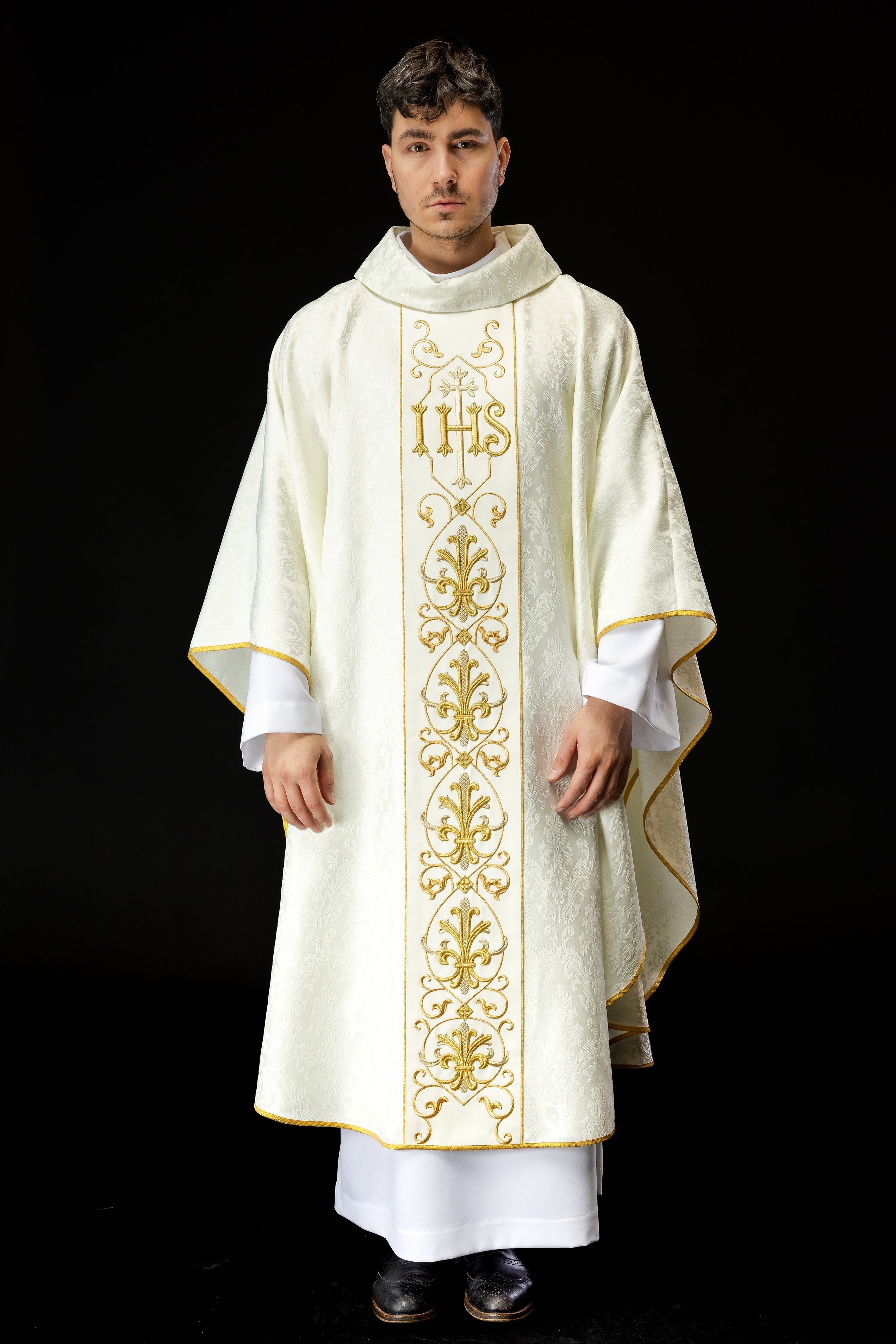 Ecru chasuble embroidered on decorative fabric with IHS symbol