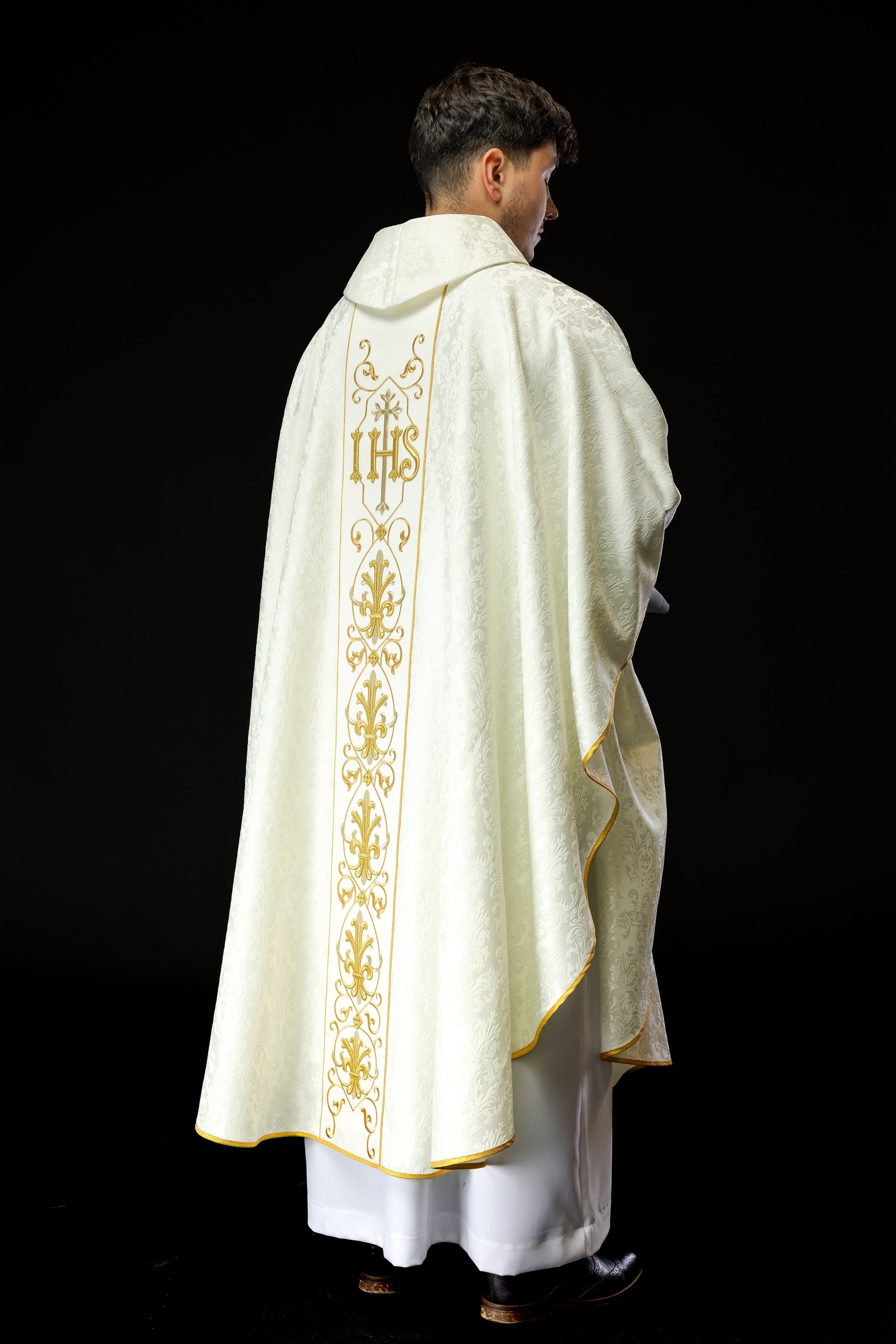 Ecru chasuble embroidered on decorative fabric with IHS symbol