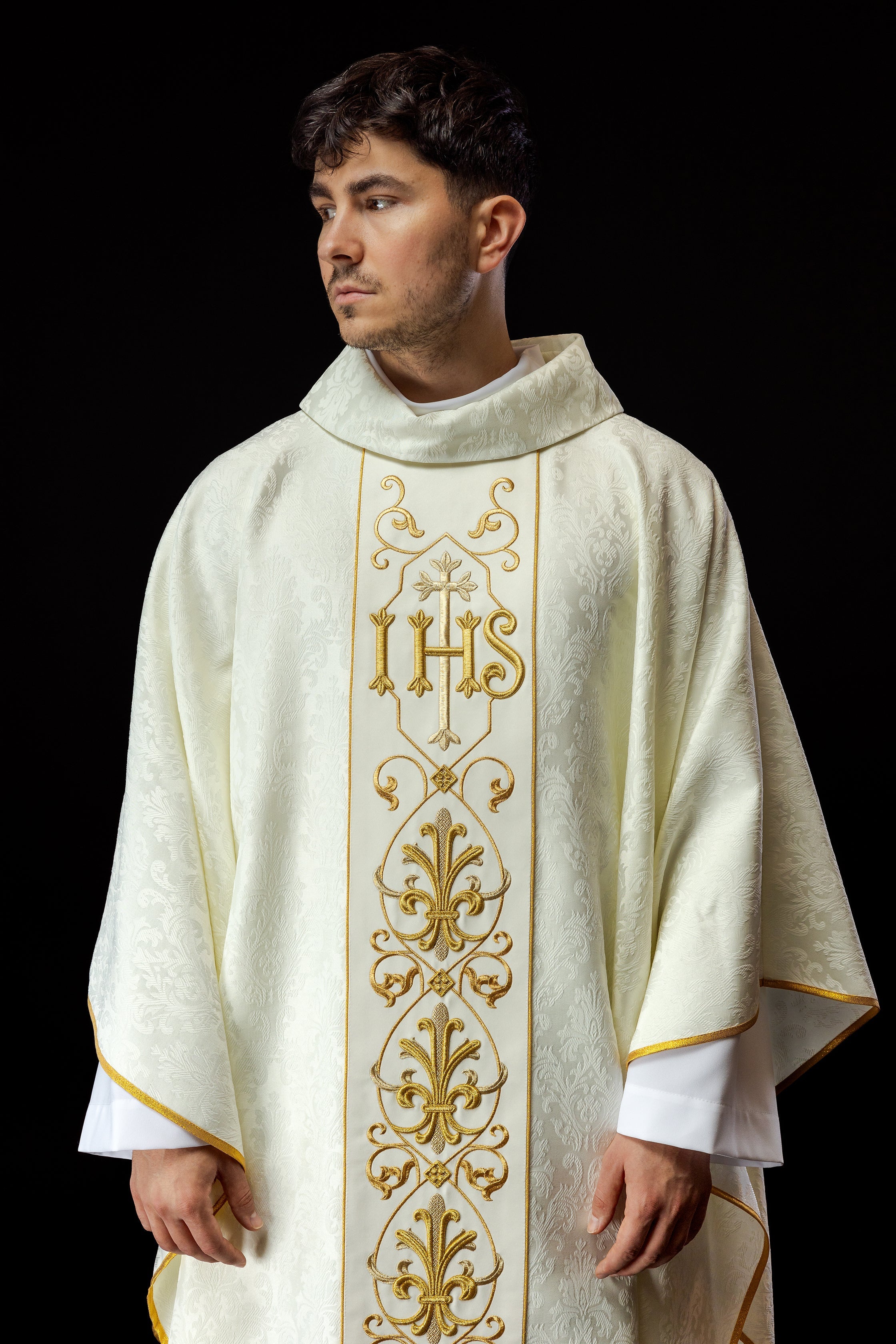 Ecru chasuble embroidered on decorative fabric with IHS symbol