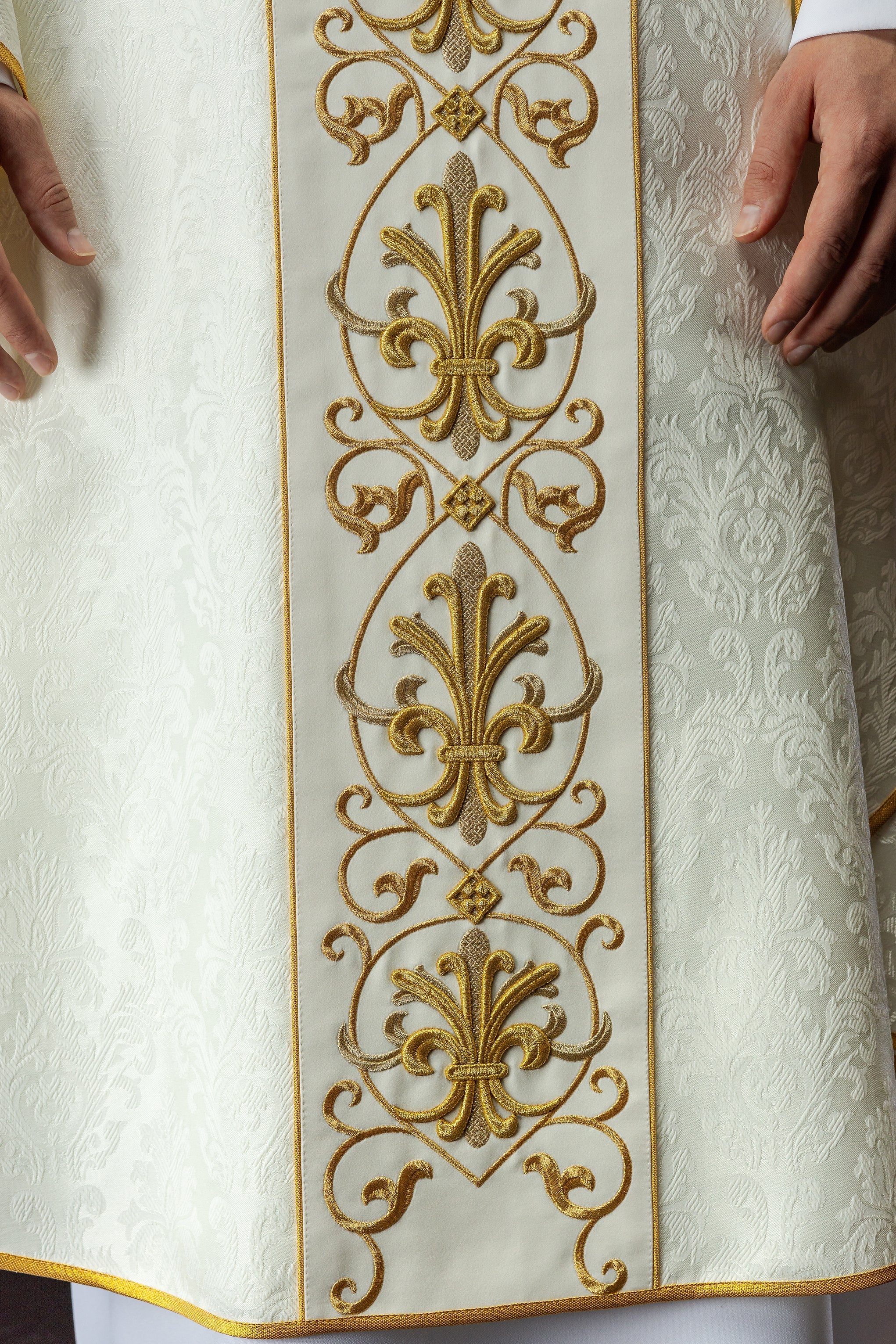 Ecru chasuble embroidered on decorative fabric with IHS symbol