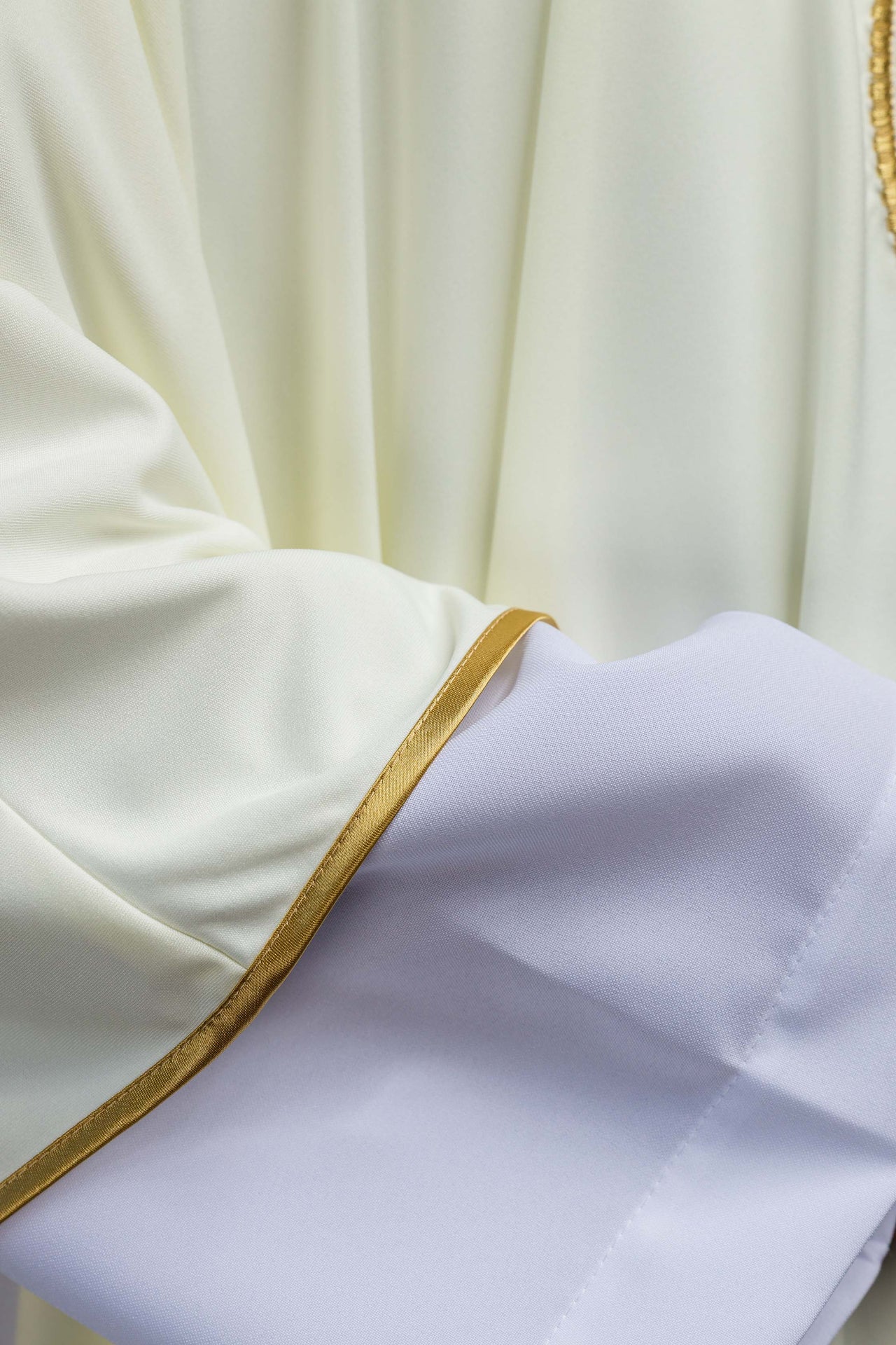 Chasuble embroidered with IHS lightweight SACROLITE knitted fabric