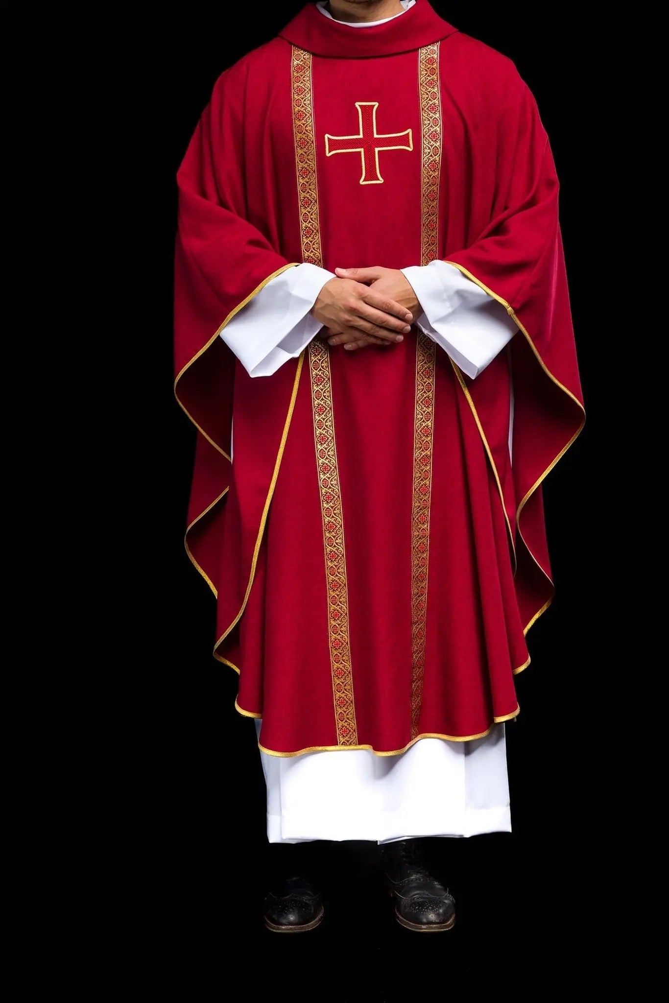 Red liturgical chasuble with embroidered cross and jacquard bands