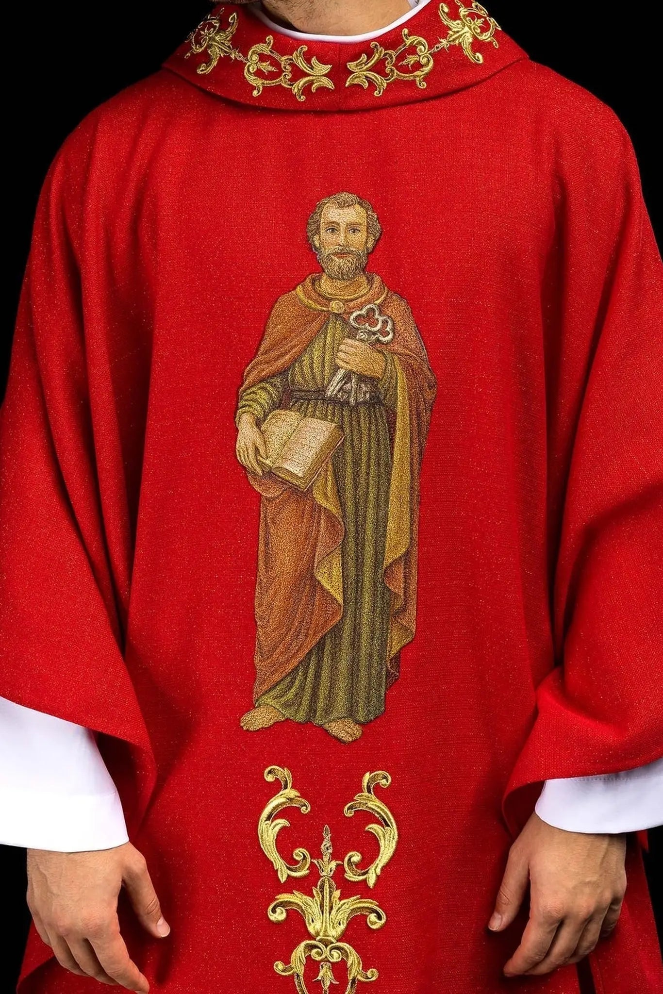 Richly embroidered chasuble with the image of Saint Peter red