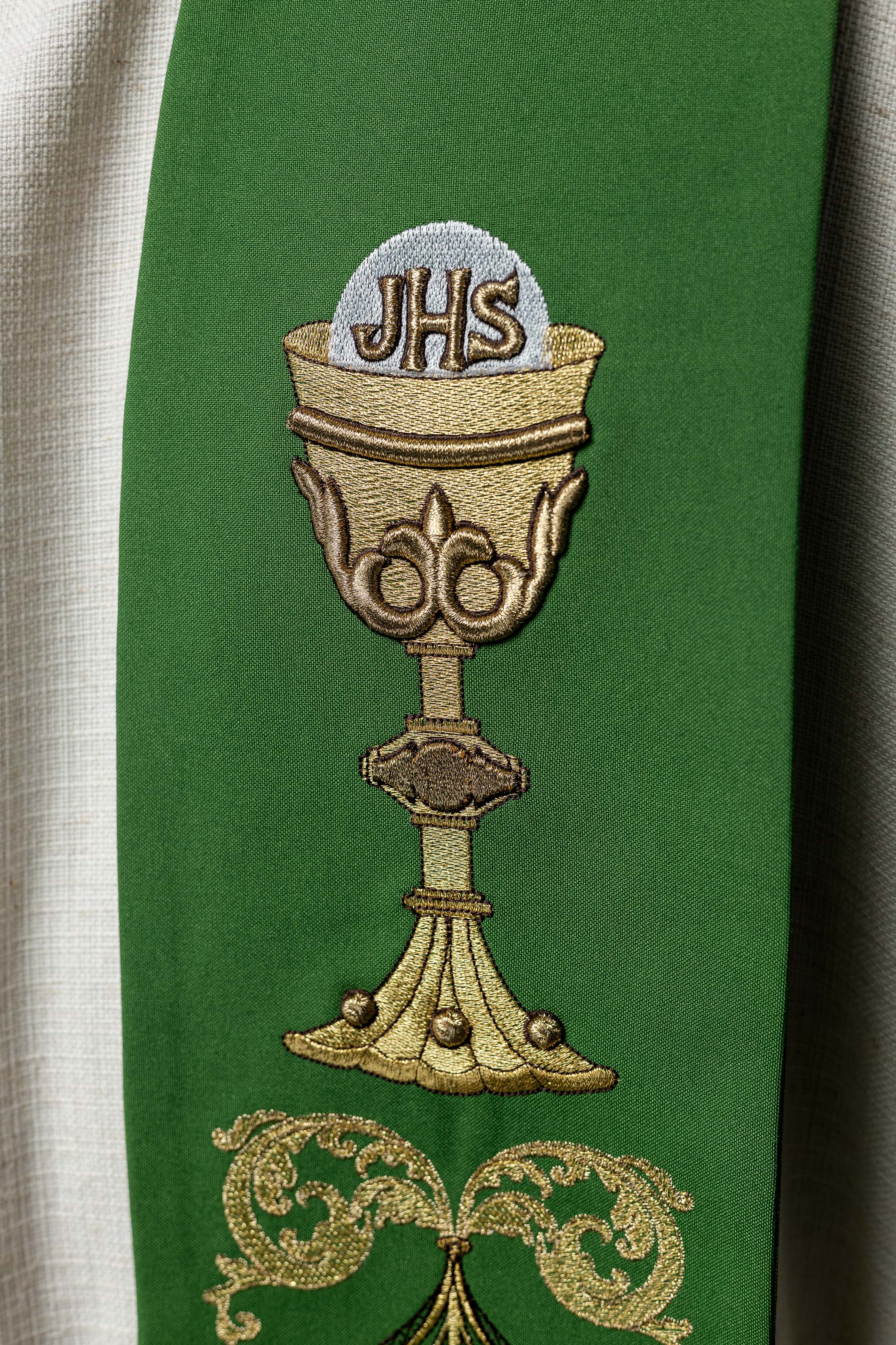 Green priest's stole IHS chalice