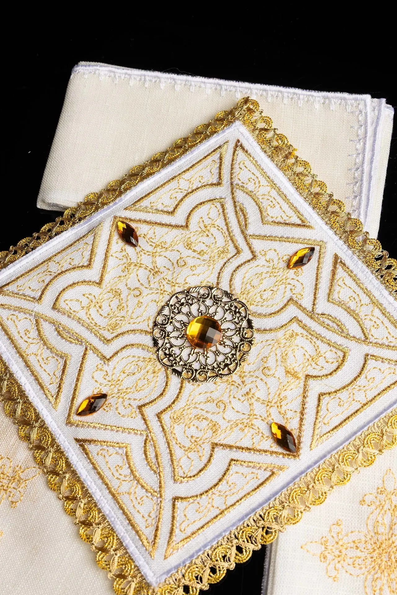 Richly decorated embroidered chalice linen
