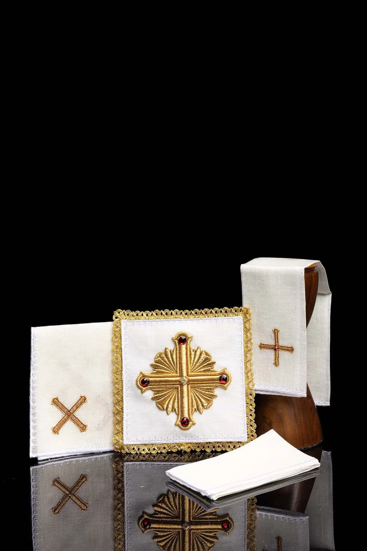Richly embroidered chalice linen with stones. Made of linen