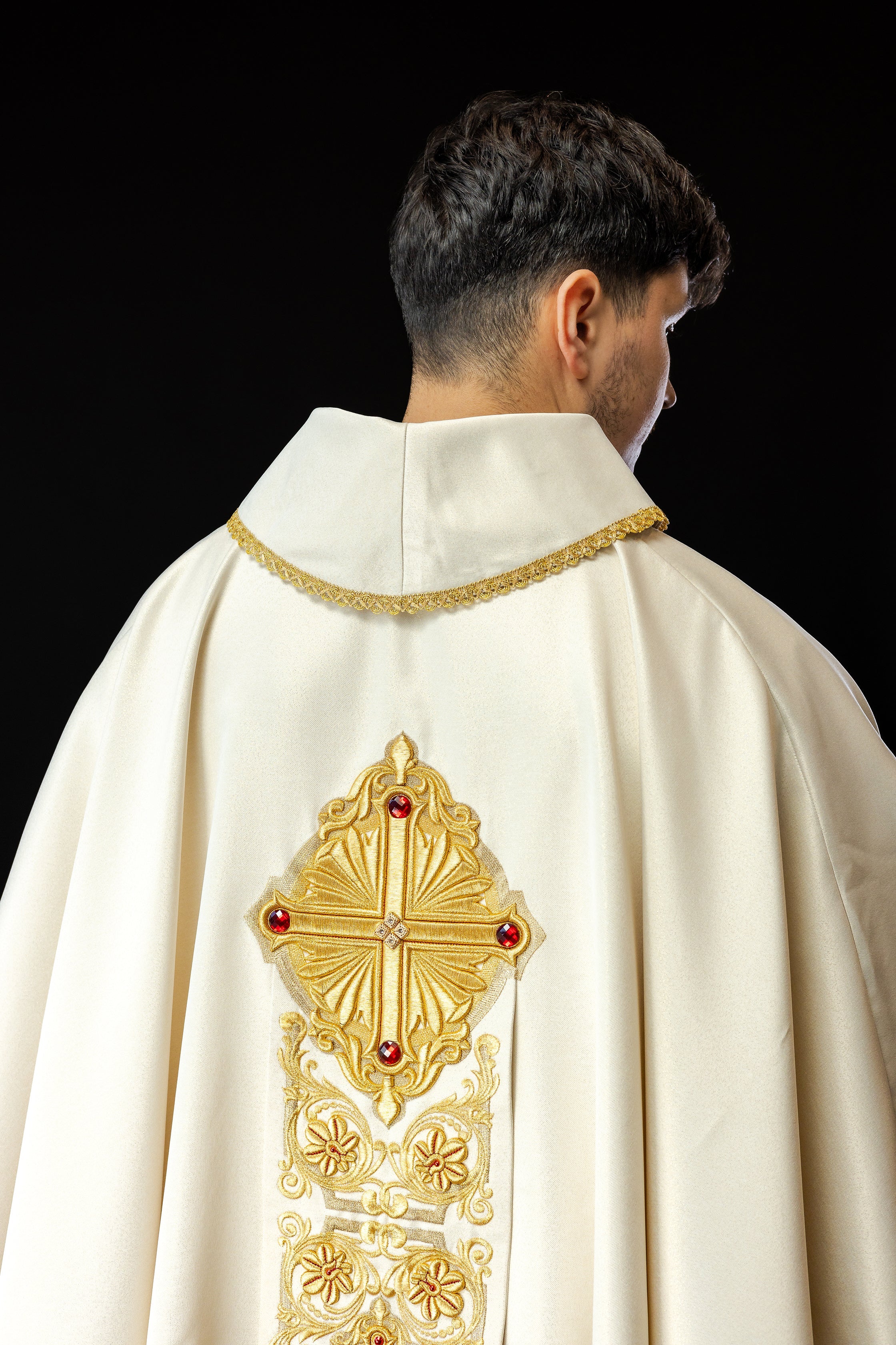 Gold chasuble richly embroidered decorated with stones