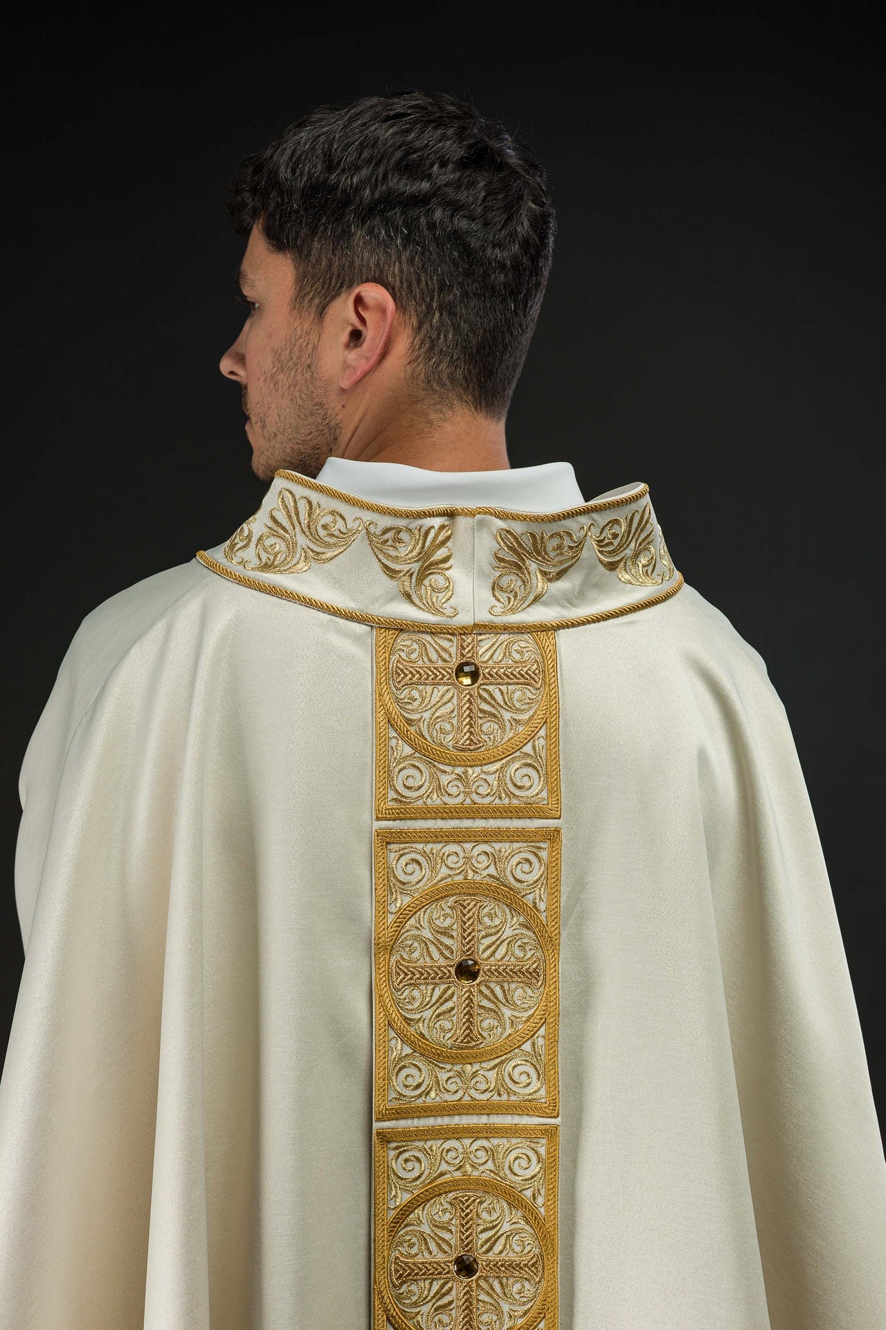 Gold chasuble richly embroidered decorated with stones
