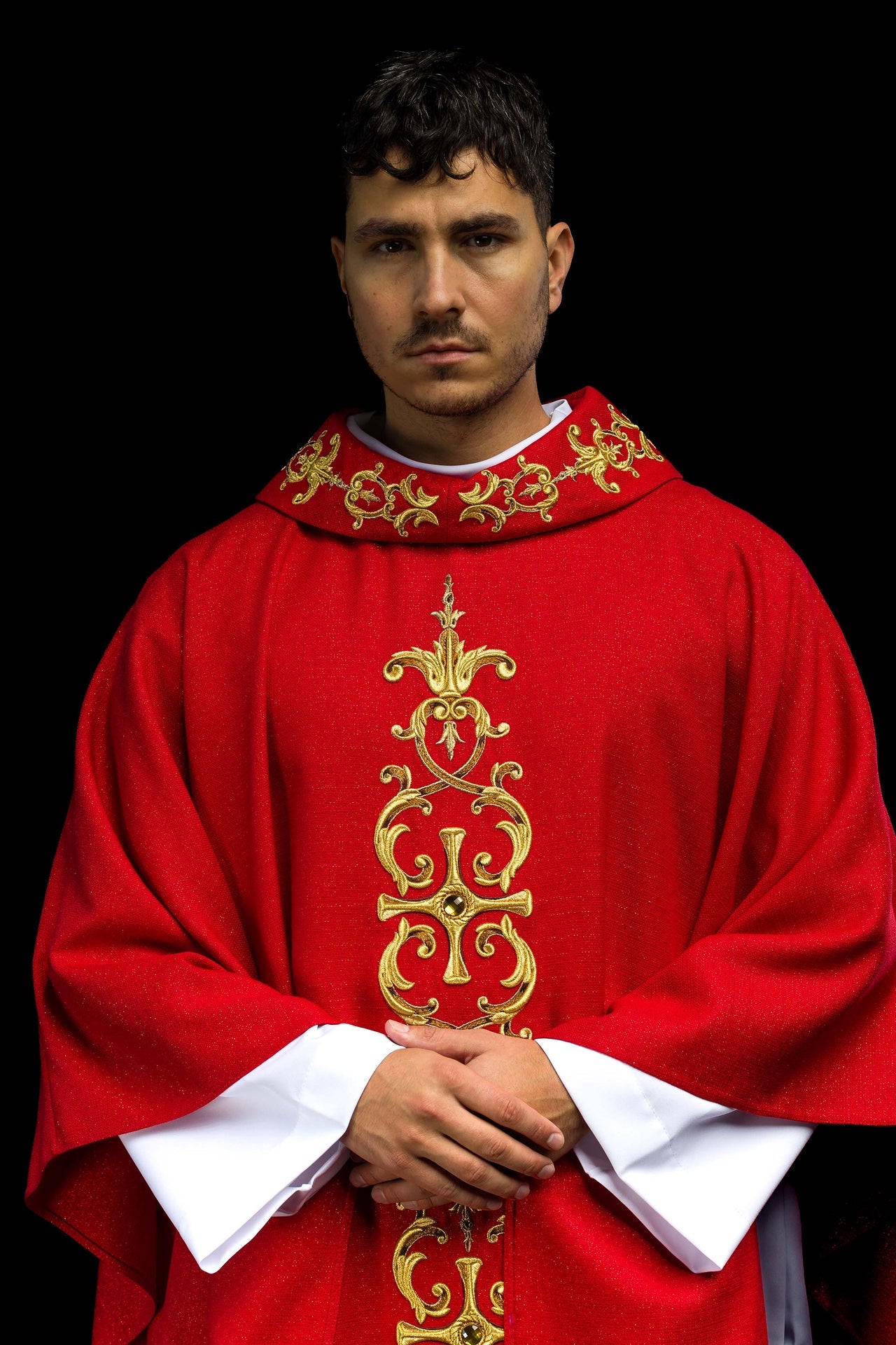 Red chasuble richly embroidered with stones