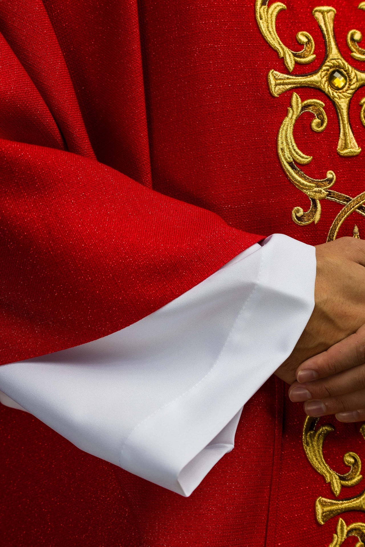 Red chasuble richly embroidered with stones