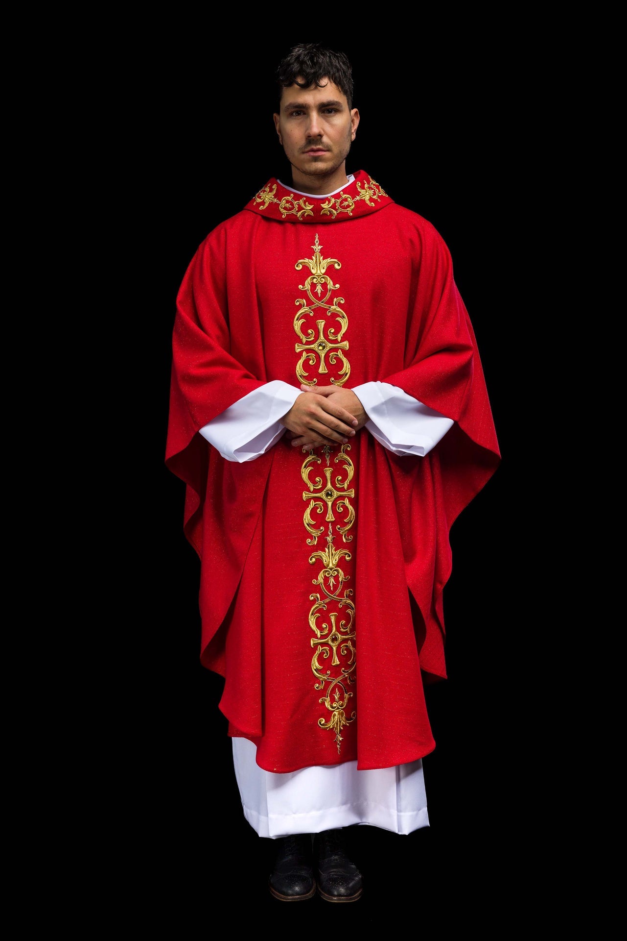 Red chasuble richly embroidered with stones