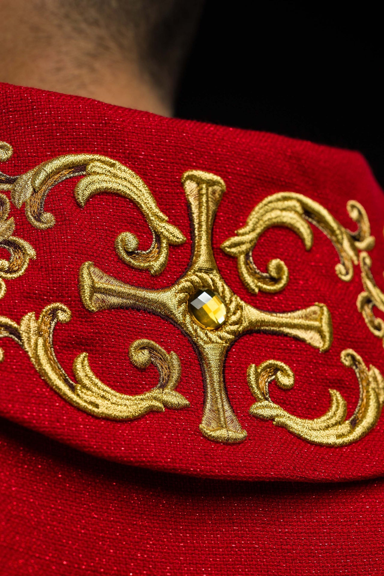 Red chasuble richly embroidered with stones