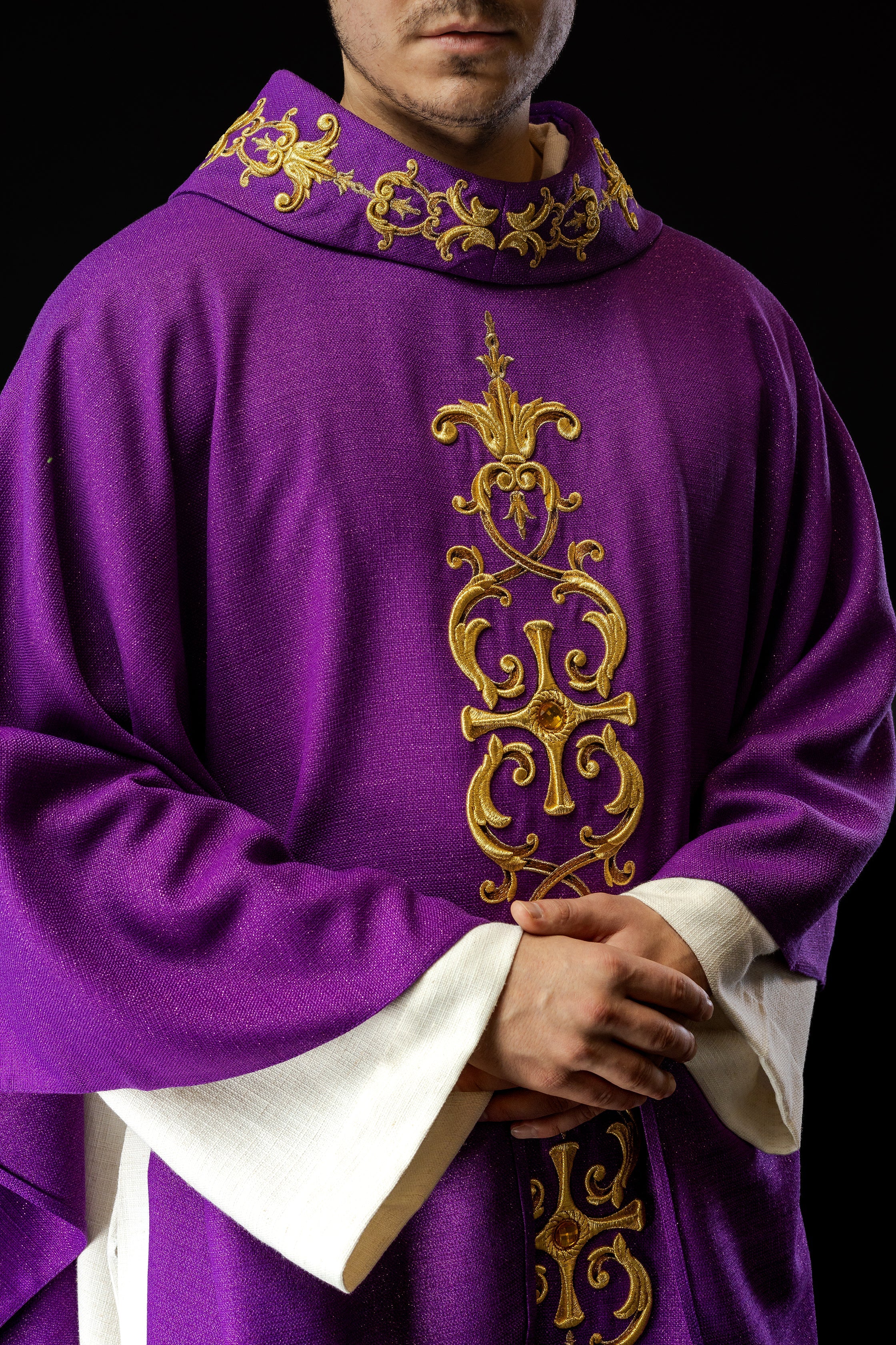 Purple chasuble richly embroidered with stones