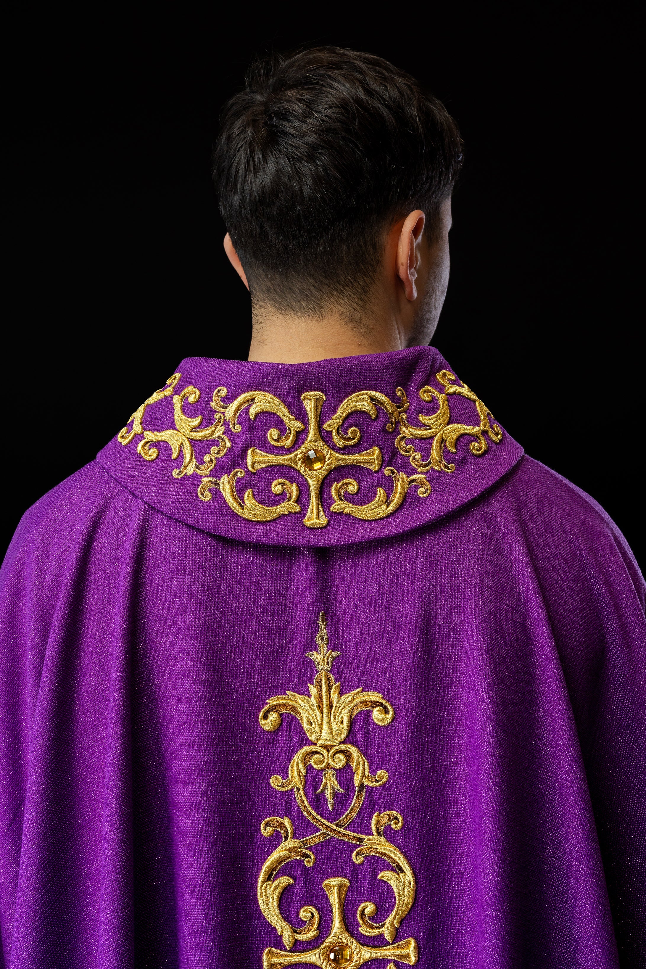 Purple chasuble richly embroidered with stones