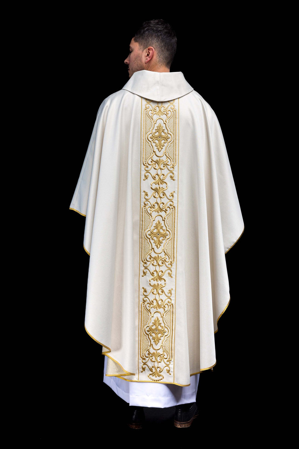 Shimmering fabric chasuble with rich gold embroidery on the belt