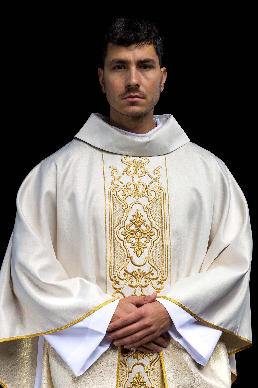 Shimmering fabric chasuble with rich gold embroidery on the belt