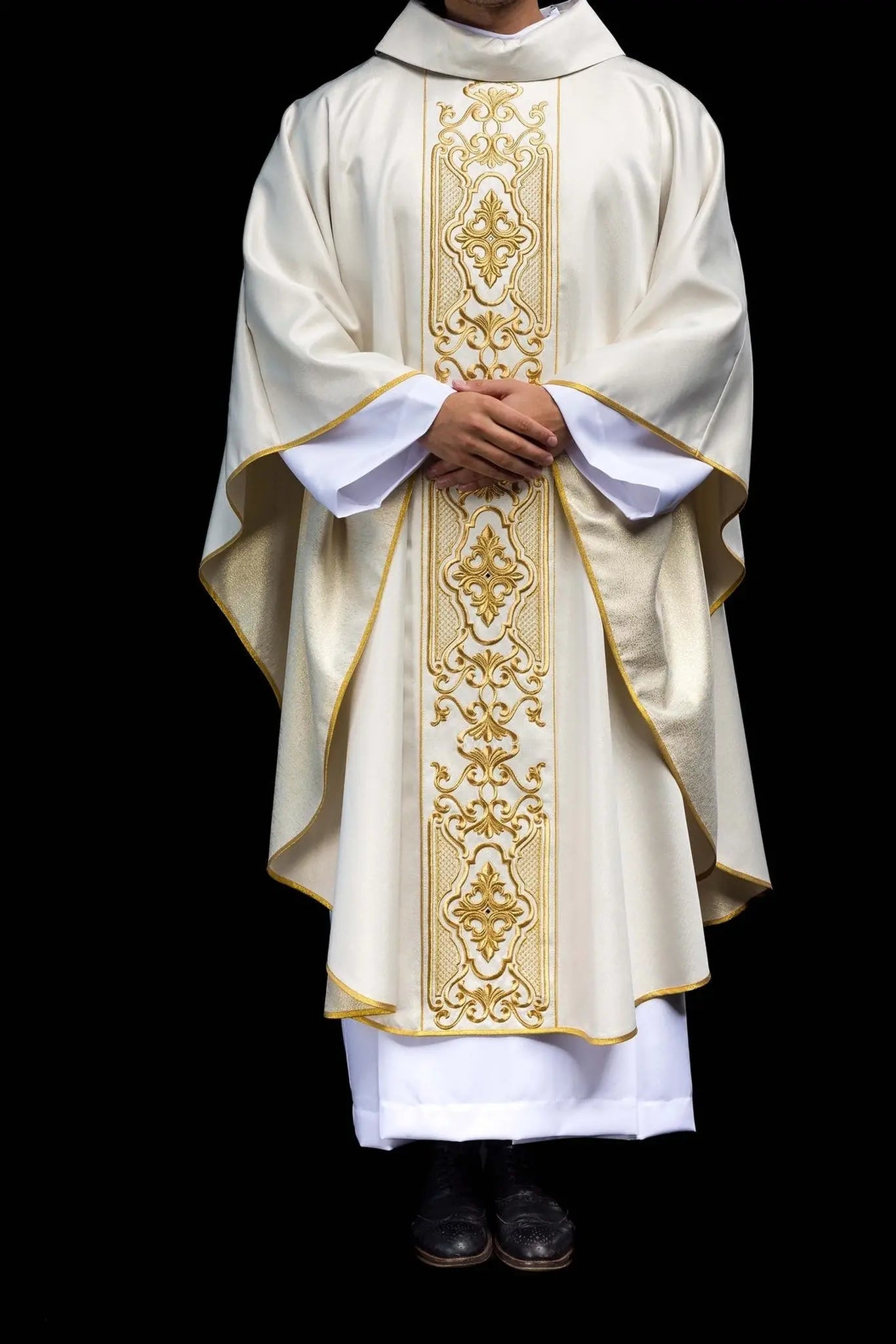Shimmering fabric chasuble with rich gold embroidery on the belt