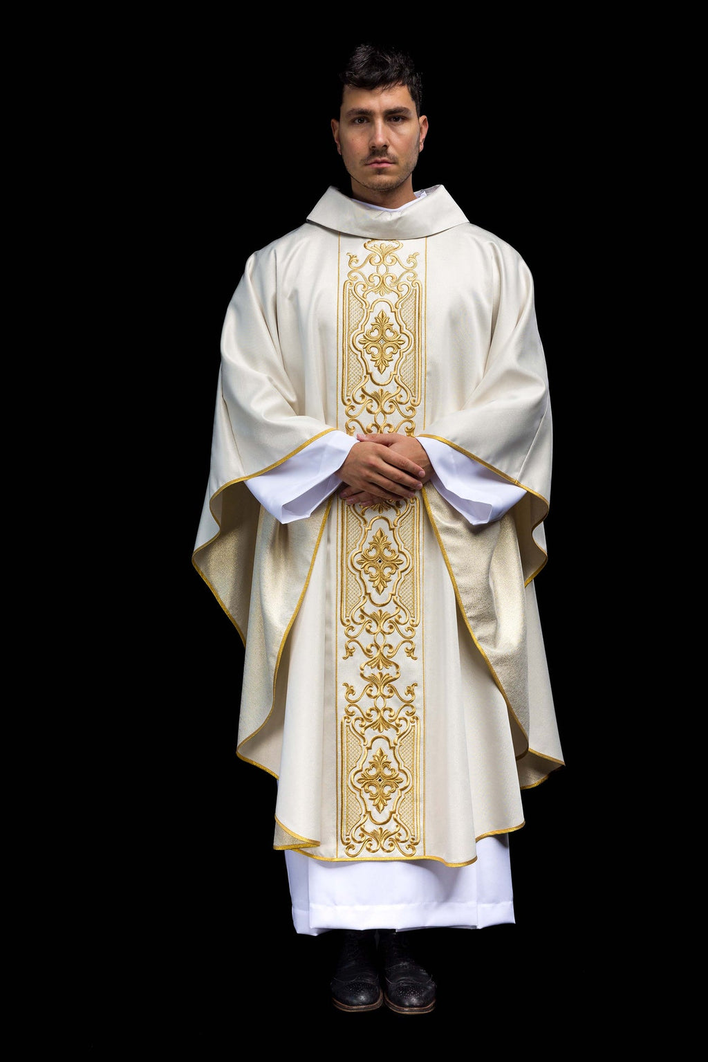 Shimmering fabric chasuble with rich gold embroidery on the belt