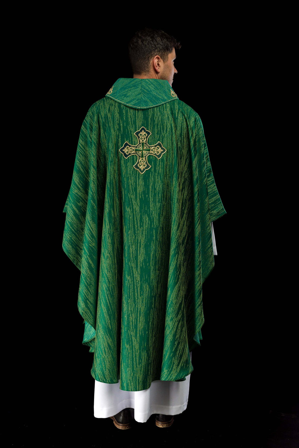 Green chasuble with richly embroidered cross and decorated collar