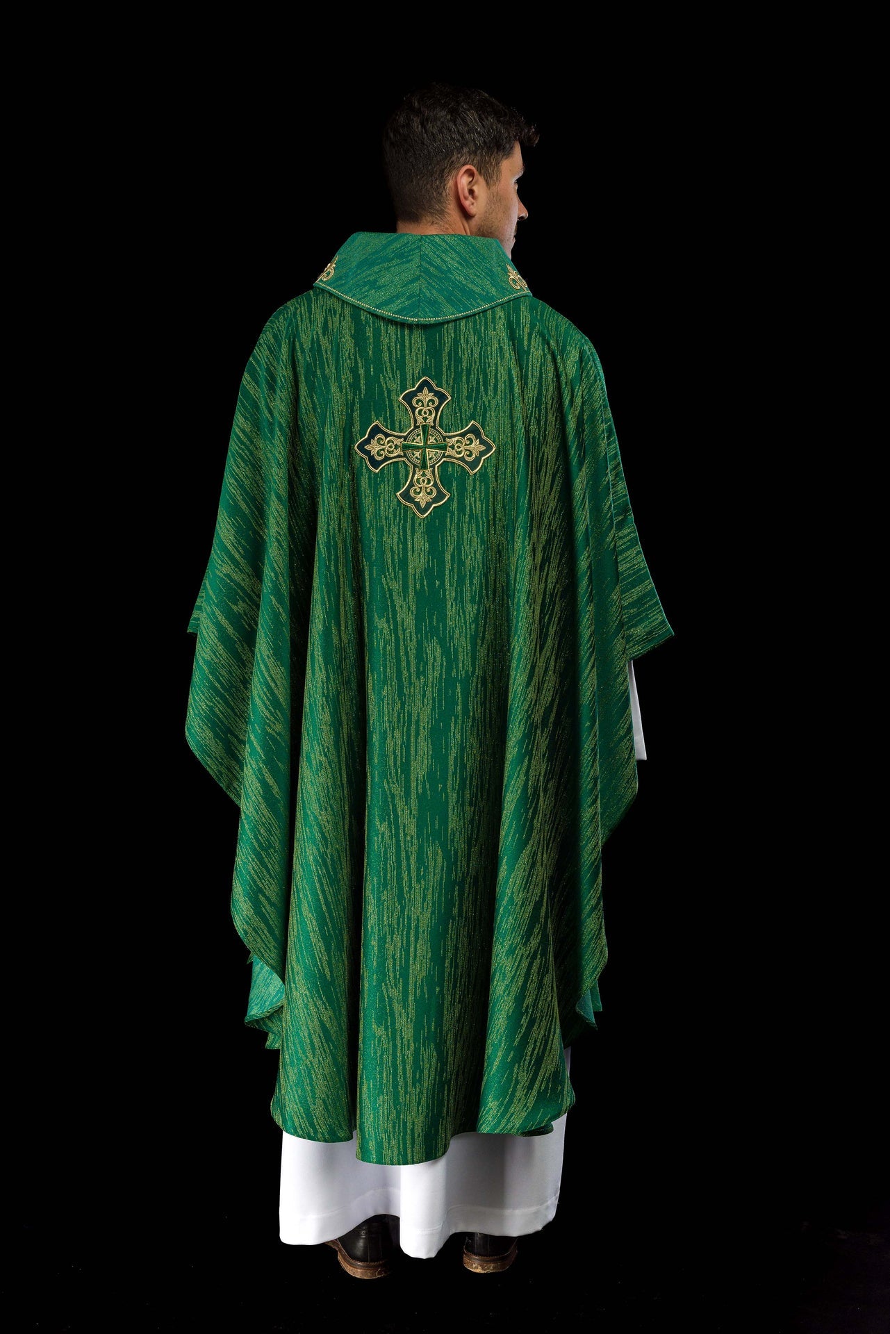 Green chasuble with richly embroidered cross and decorated collar