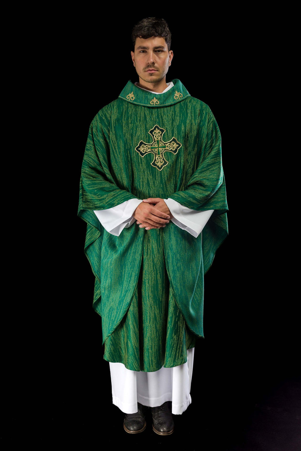 Green chasuble with richly embroidered cross and decorated collar