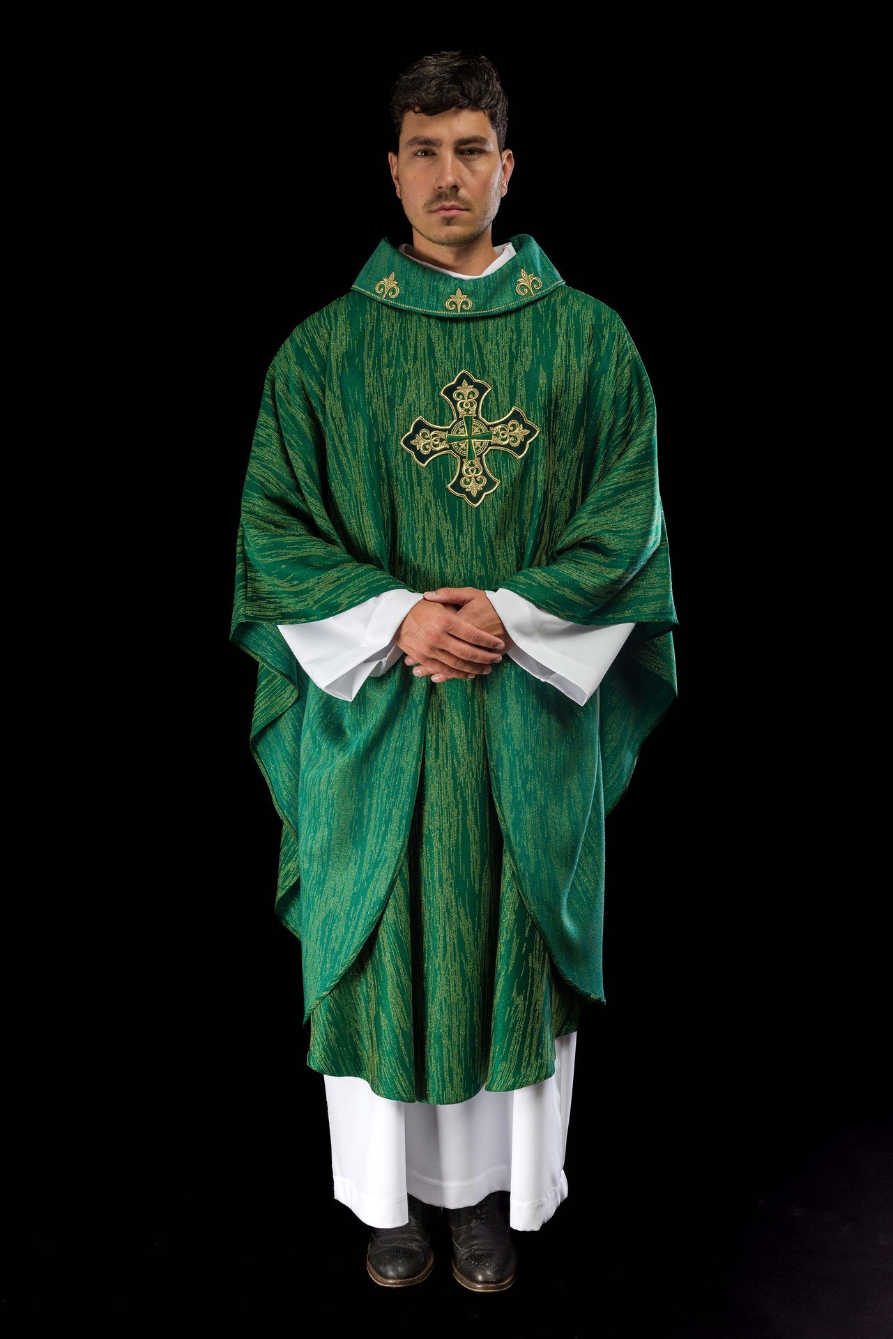Green chasuble with richly embroidered cross and decorated collar